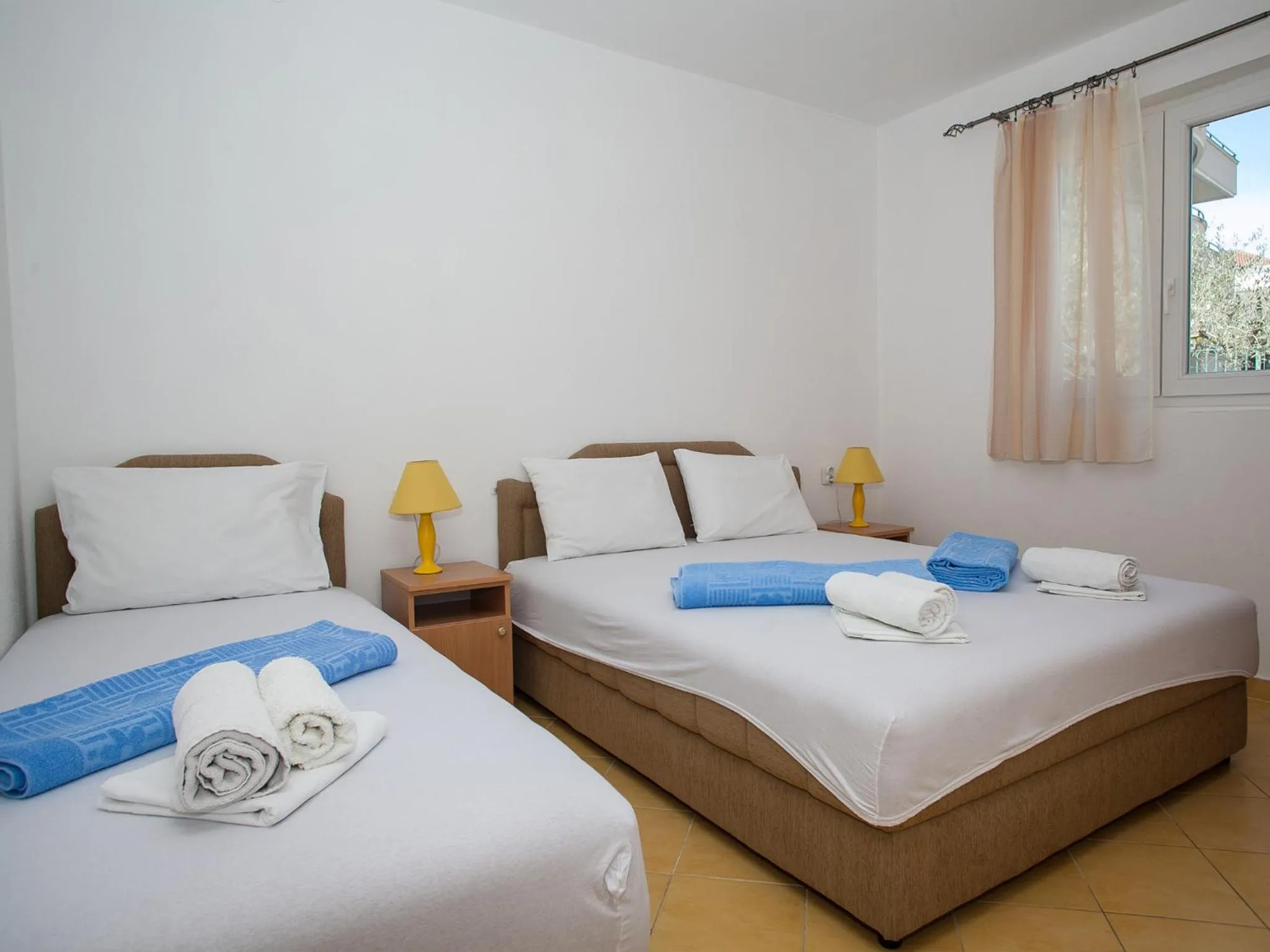 Bed in Daria Apartments