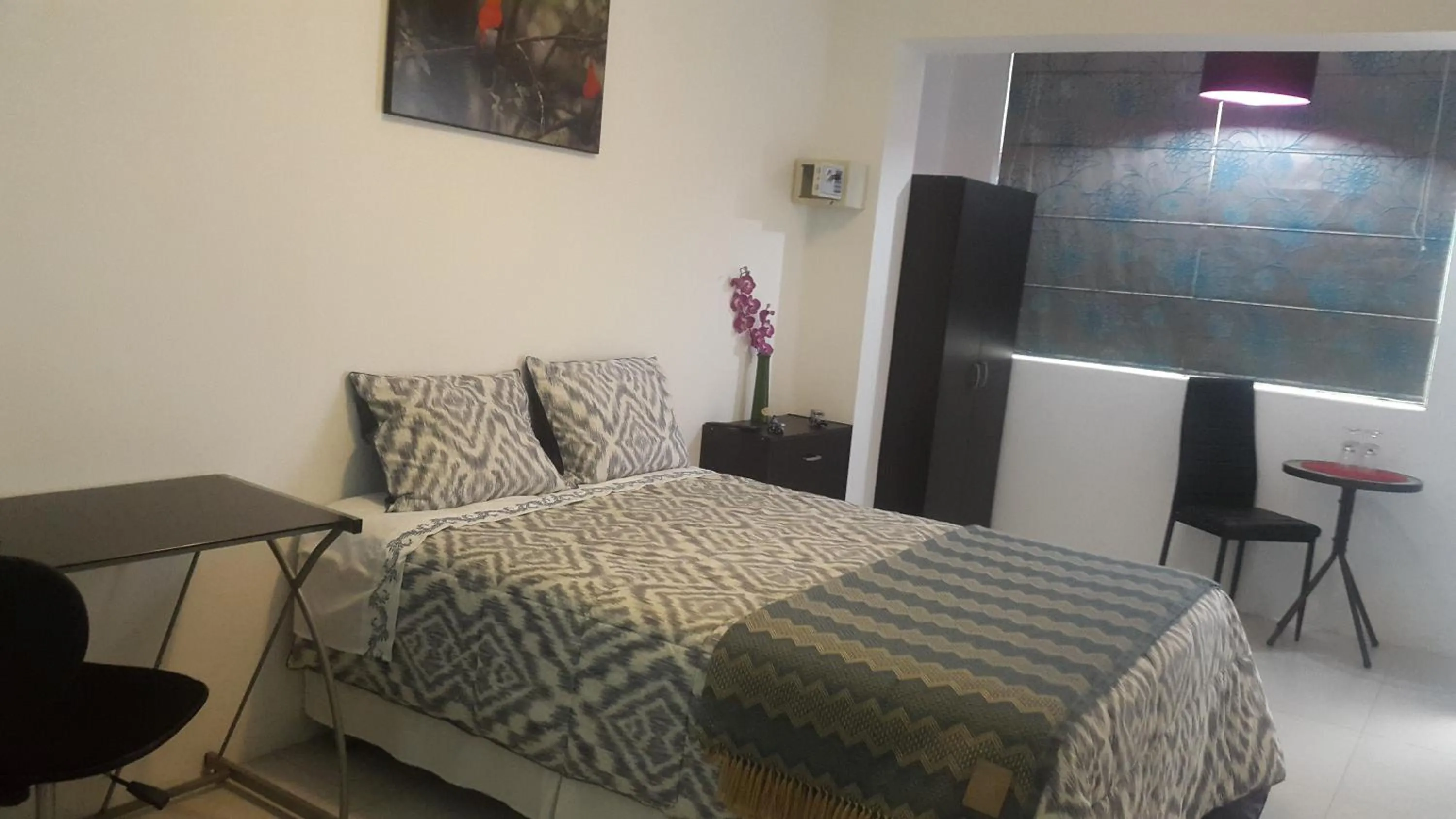 Bed in Magicperu Apart Hotel