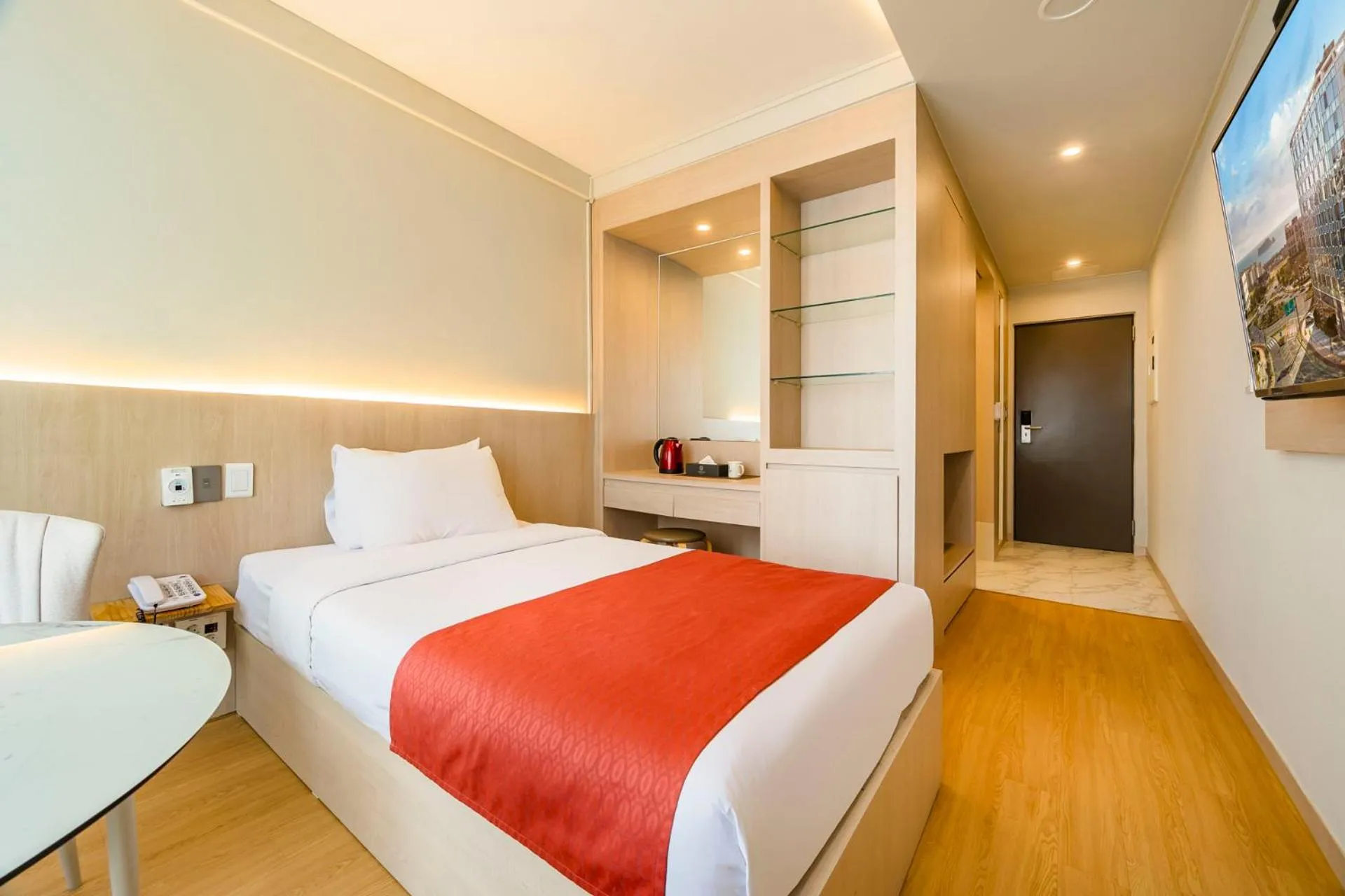 Bed in Shin Shin Hotel Jeju Worldcup