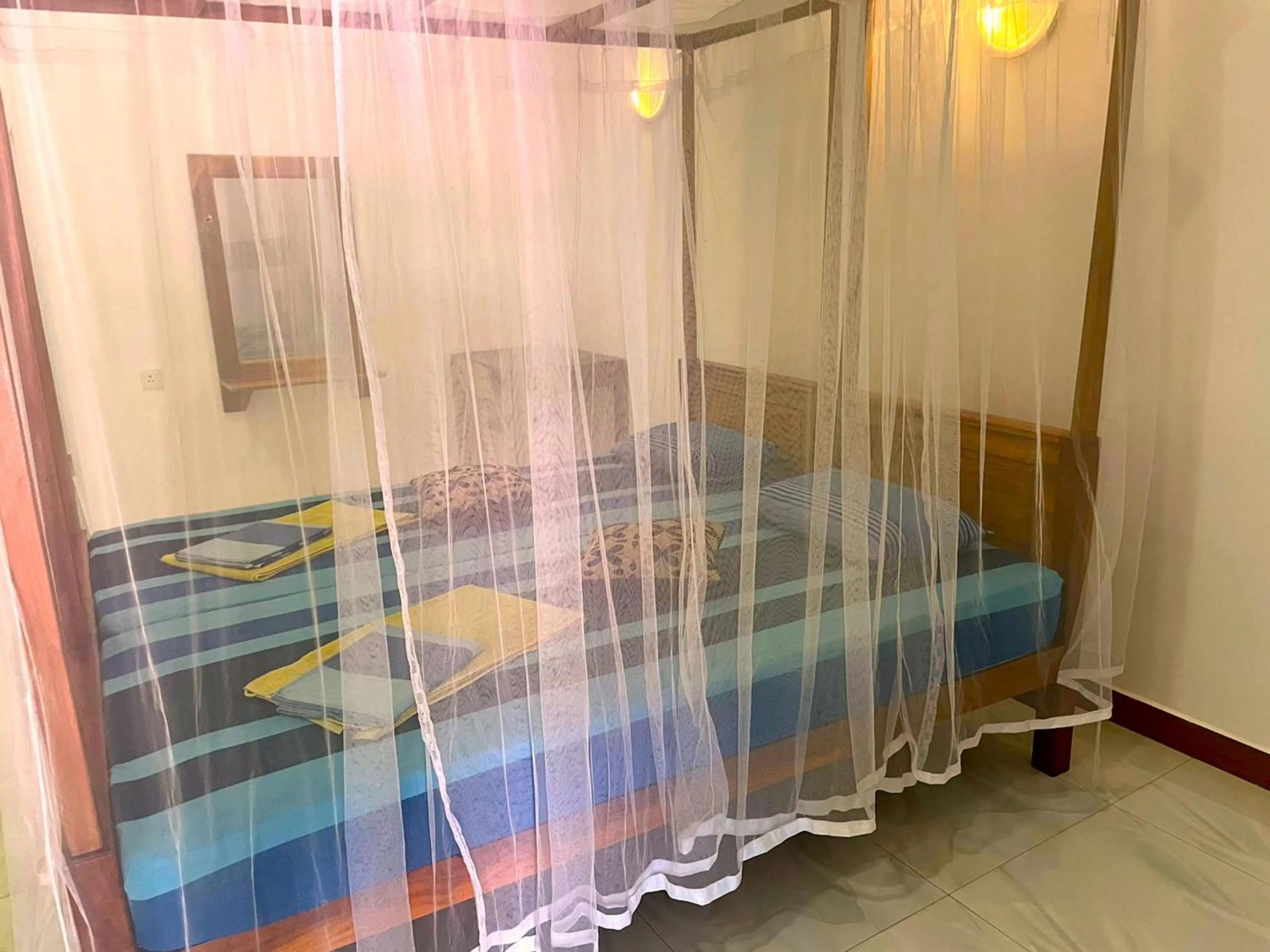 Bed in La Safari Inn Tissamaharama