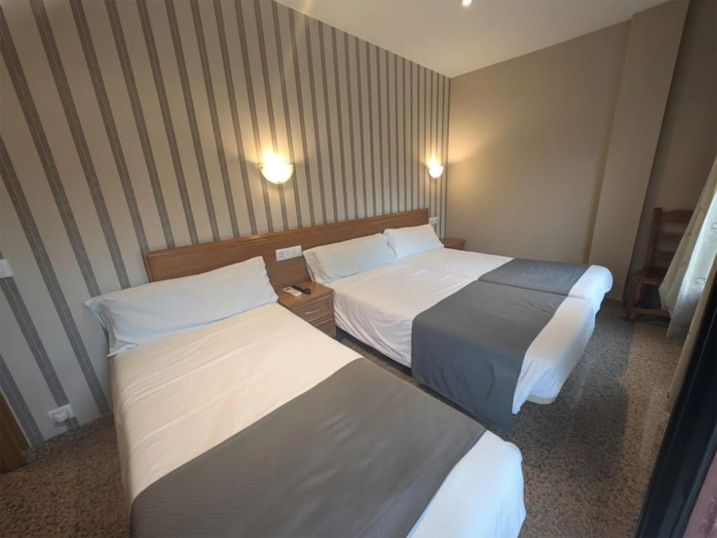 Bed in Hospedería Puerta de la Catedral