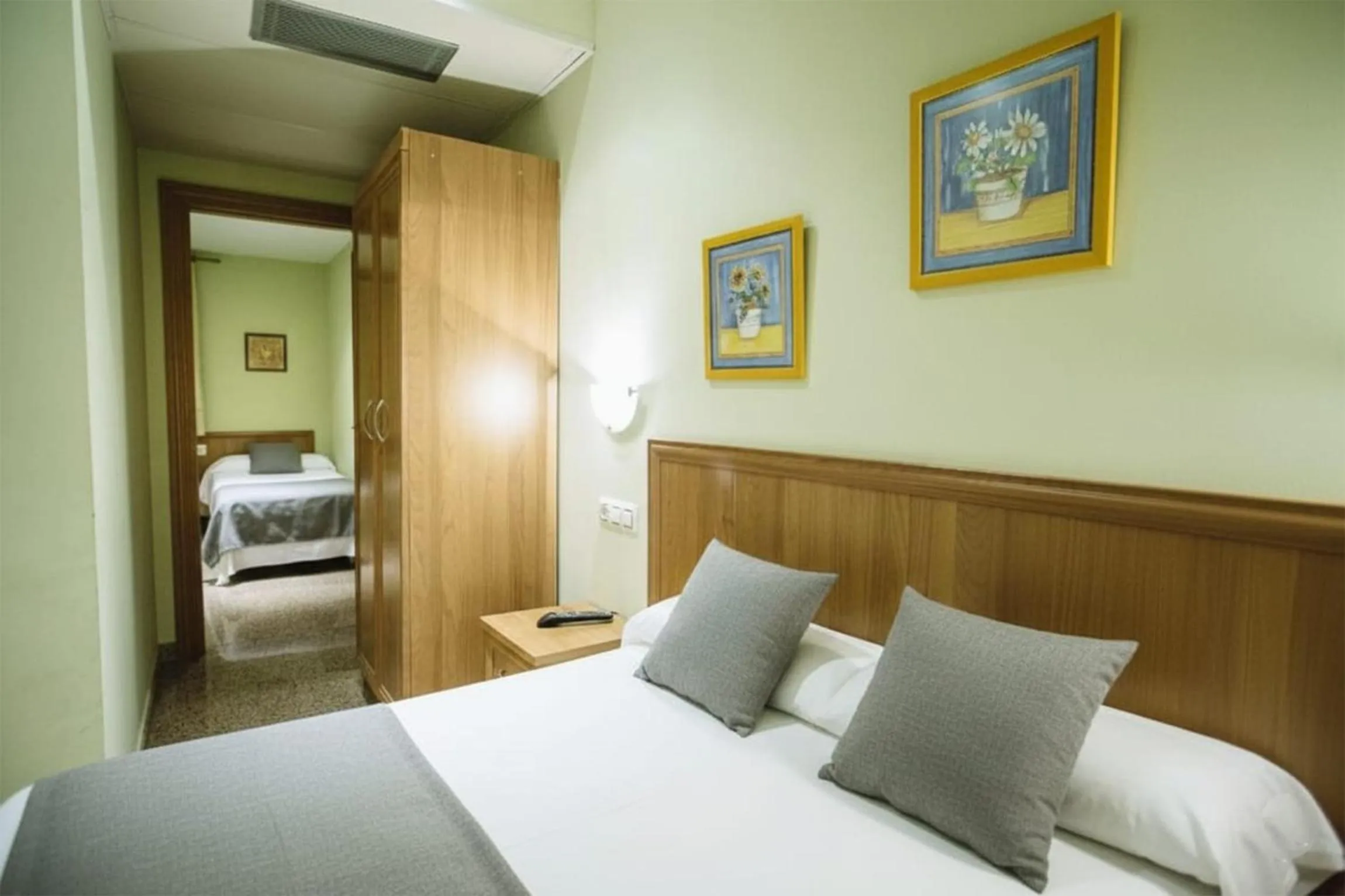 Bed in Hospedería Puerta de la Catedral