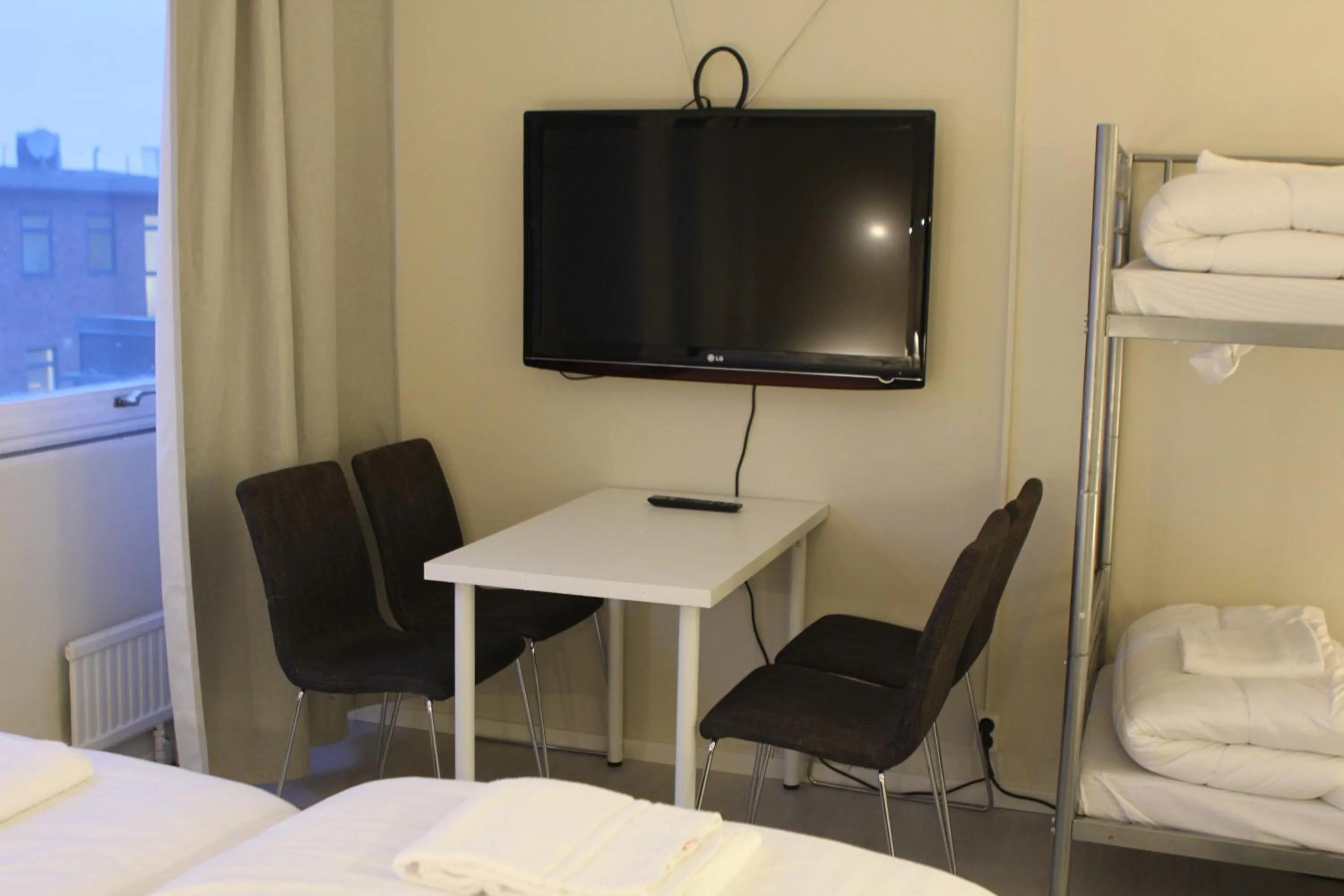 Dining area, Bed in Hotell Bromma