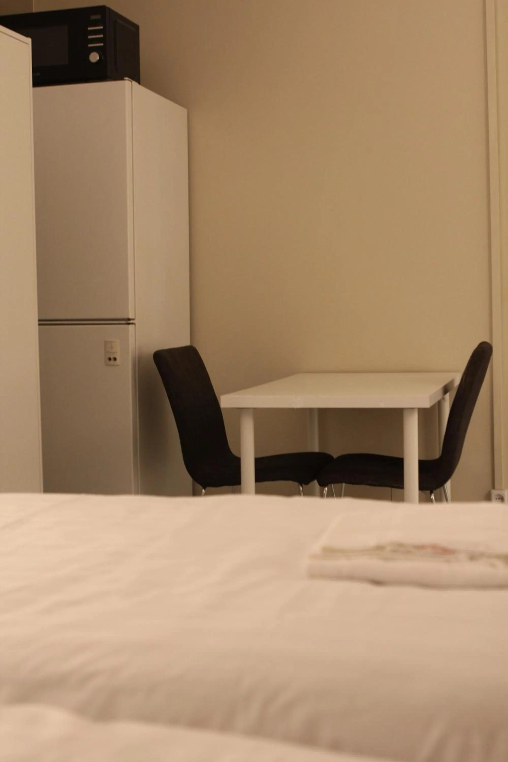 Dining area, Bed in Hotell Bromma