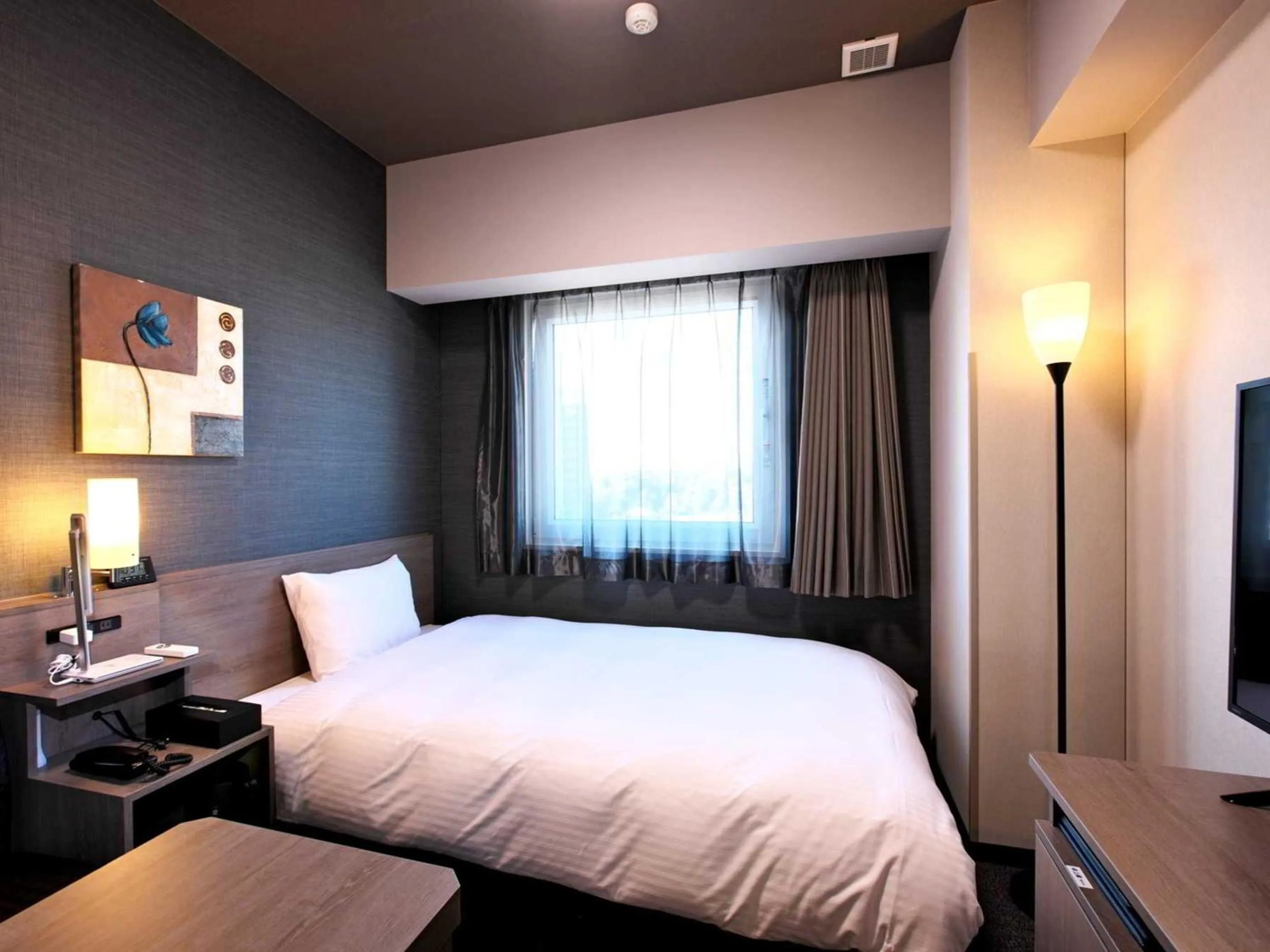 Photo of the whole room, Bed in Hotel Route Inn Grand Moriya Ekimae