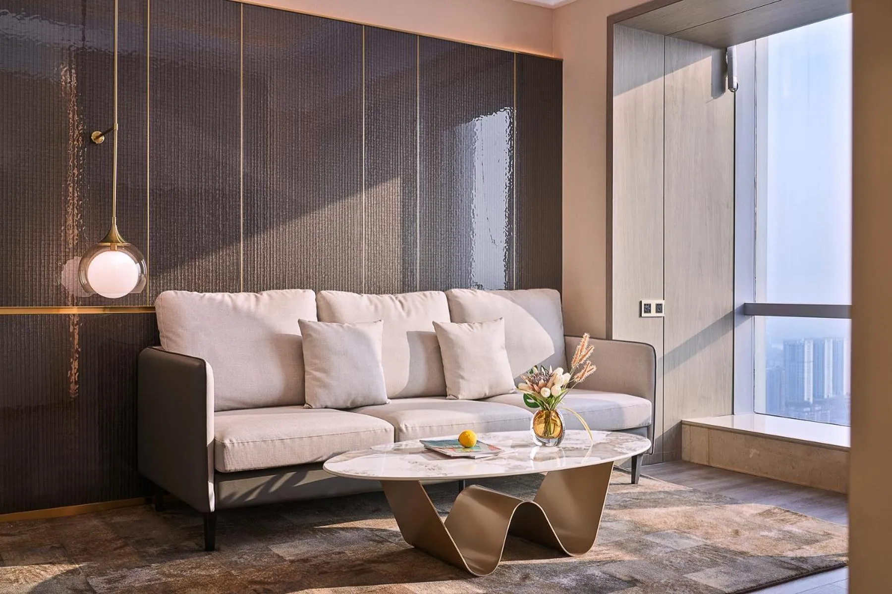Living room in Echarm plus International Hotel Guangzhou Changgang Metro Station Branch - Free Shuttle Bus to Canton Fair Complex During Canton Fair Period