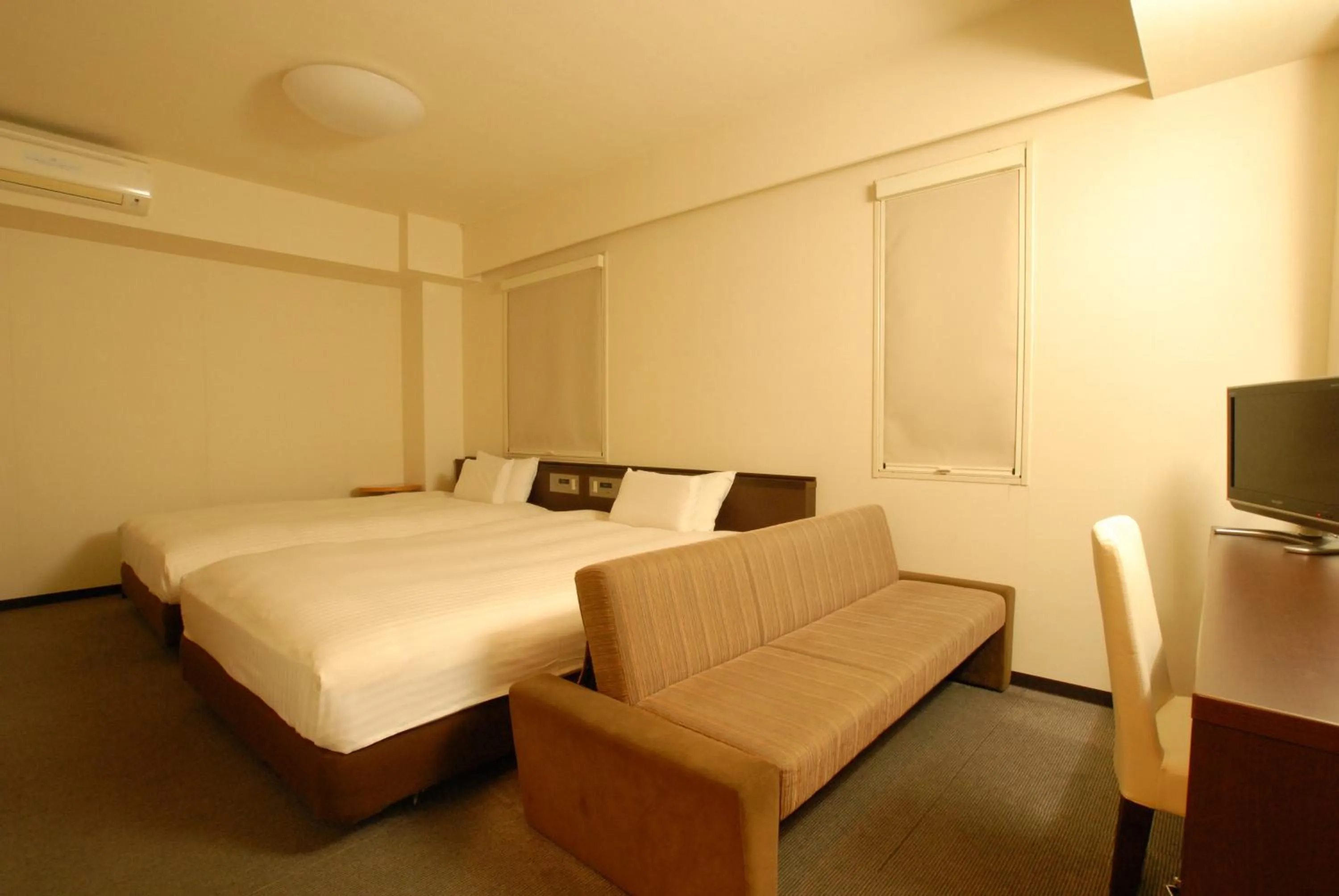 Bed in AB Hotel Okazaki