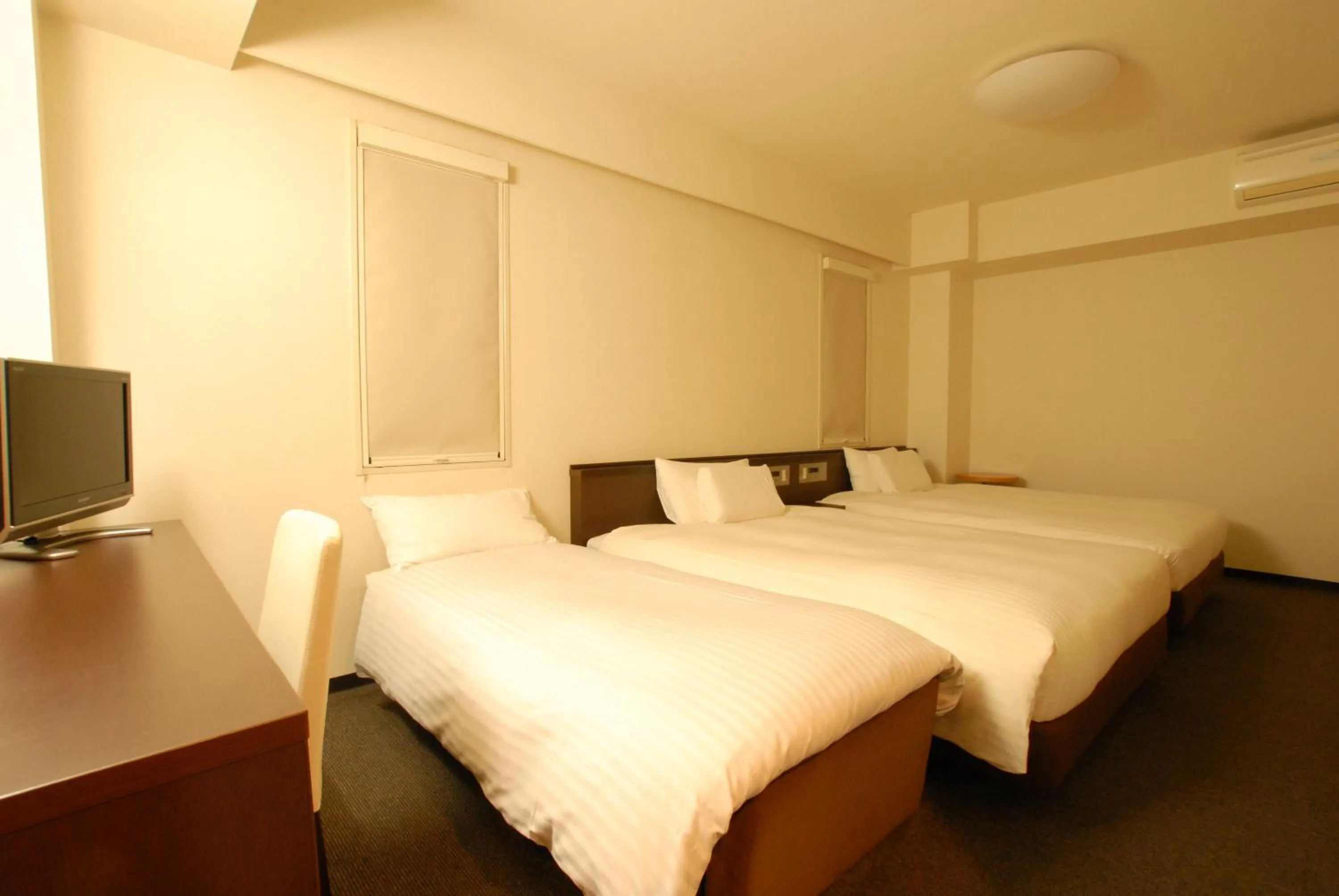 Bed in AB Hotel Okazaki