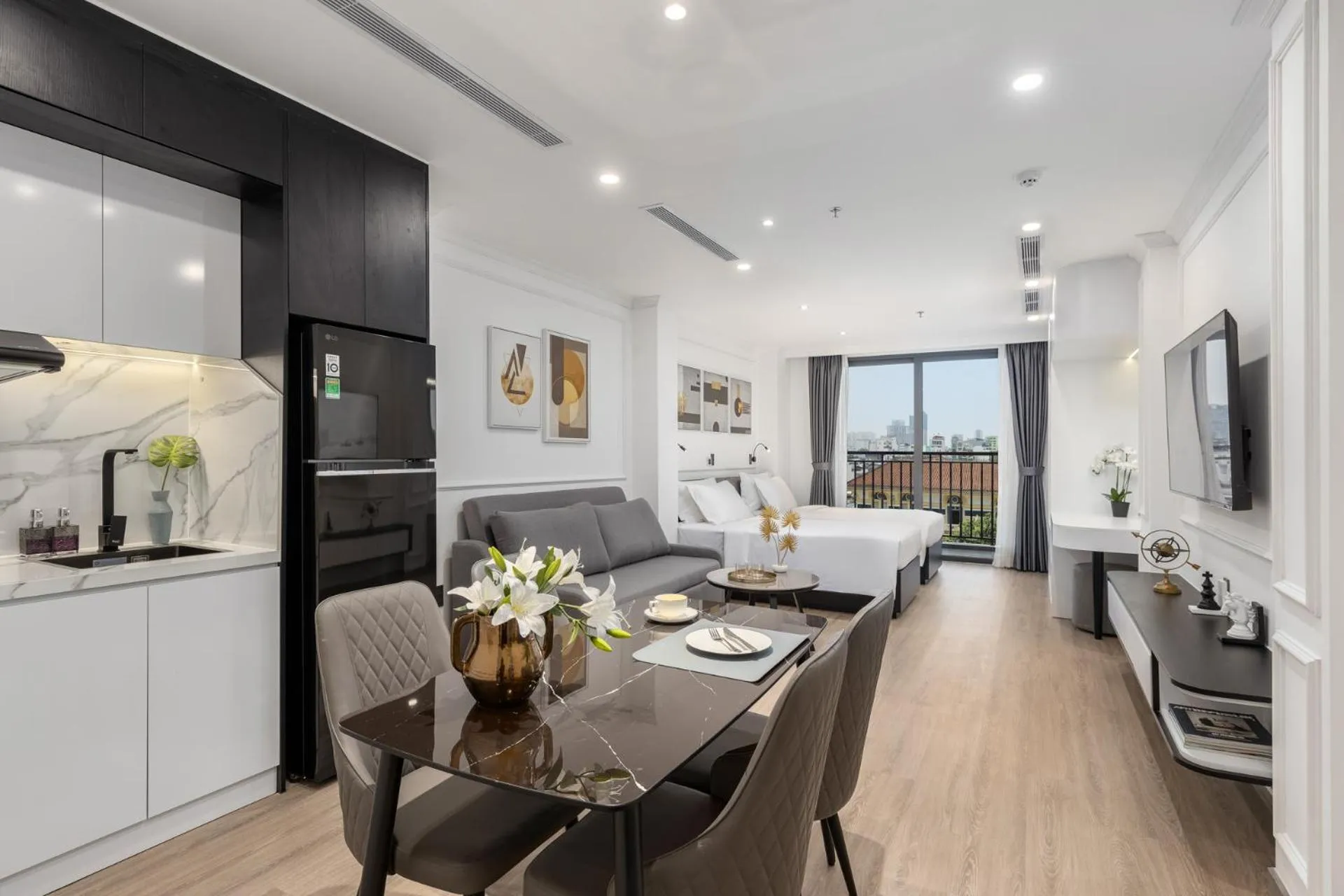 Photo of the whole room in CityHouse- El Pino Realm at Metro Ben Thanh Market