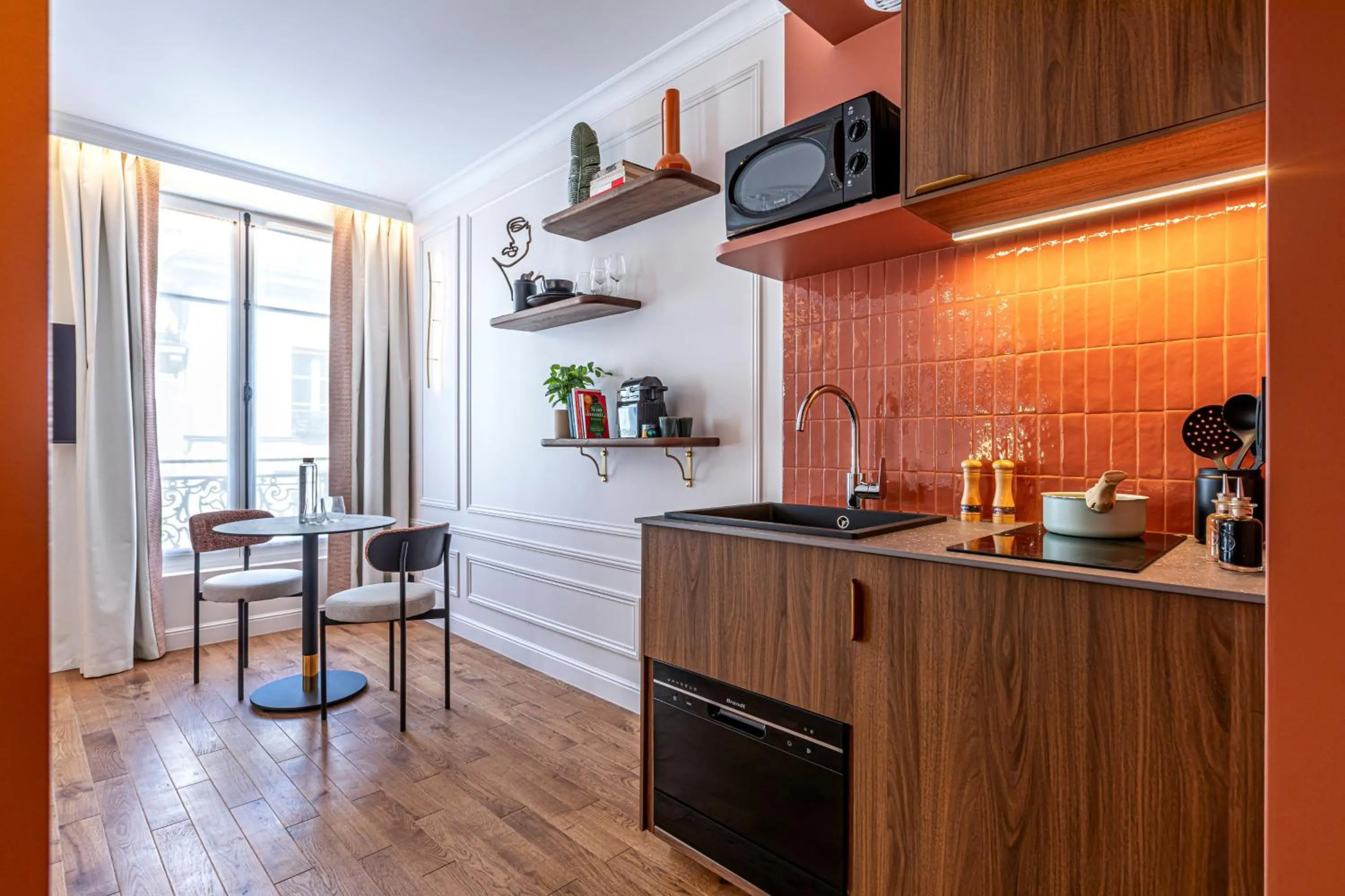 Kitchen or kitchenette in Villa SoPi Appart'Hotel by Patrick Hayat