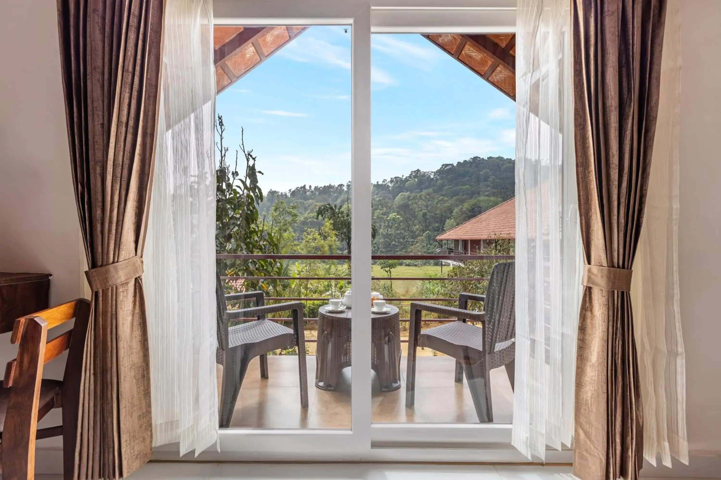 Valley View Premier Room with Sitout in Sterling Brookstone Coorg Valley View Premier Room with Sitout in Sterling Brookstone Coorg
