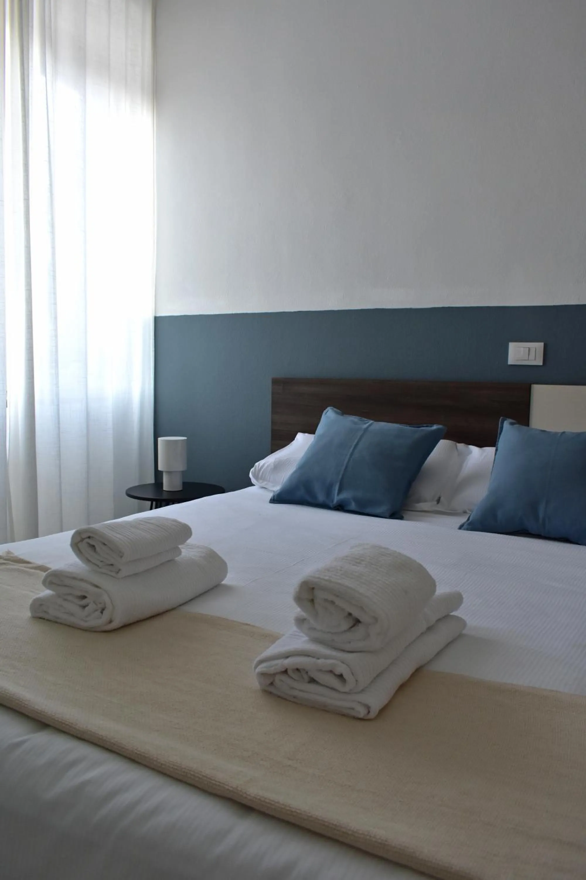 Bedroom, Bed in Poggio Al Lago Apartments & Rooms