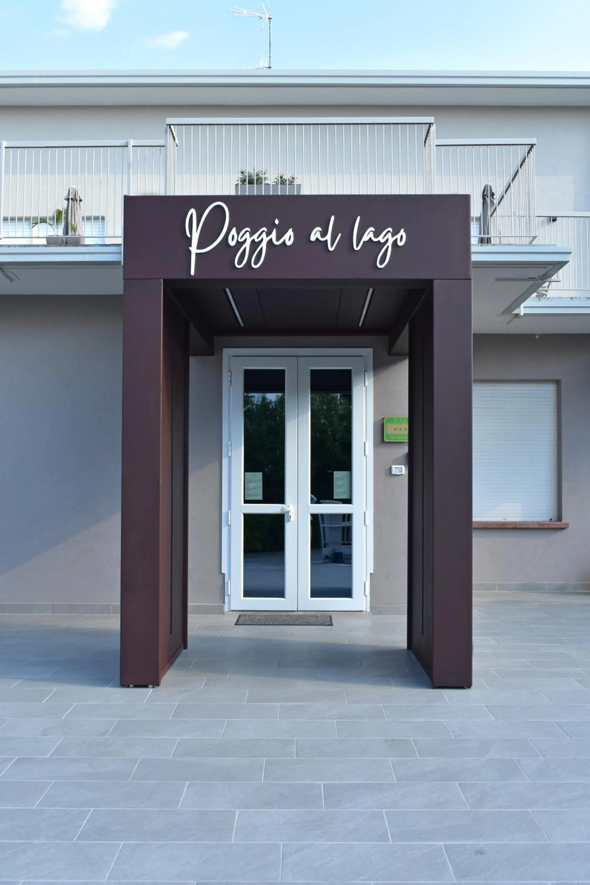 Facade/entrance in Poggio Al Lago Apartments & Rooms