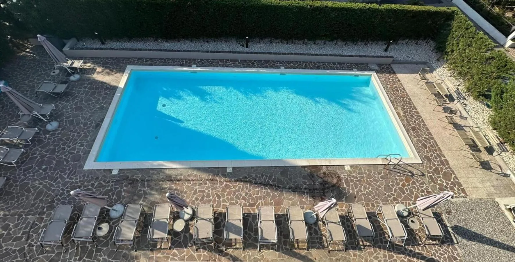 Swimming pool in Poggio Al Lago Apartments & Rooms
