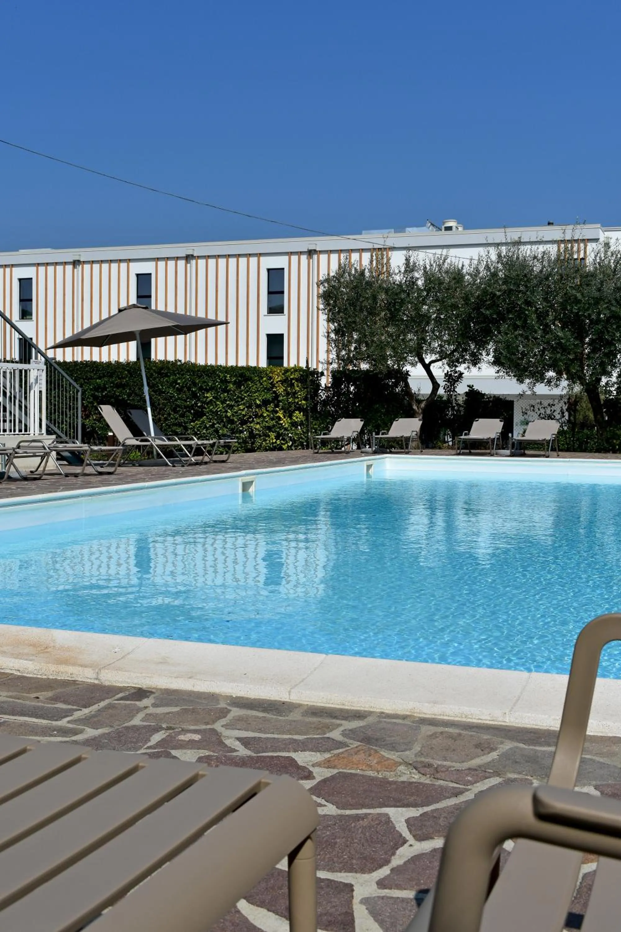 Swimming pool in Poggio Al Lago Apartments & Rooms