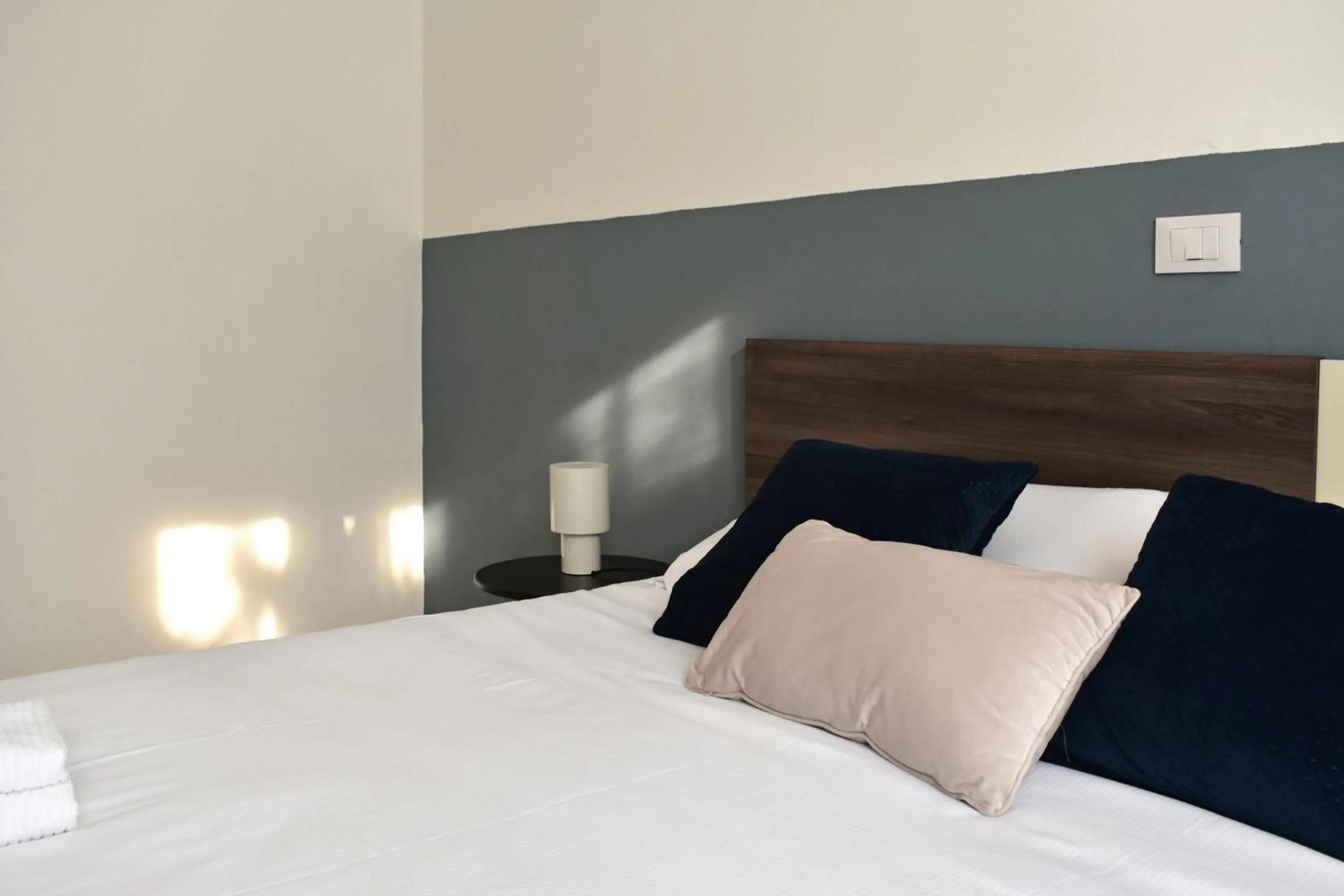 Bedroom, Bed in Poggio Al Lago Apartments & Rooms