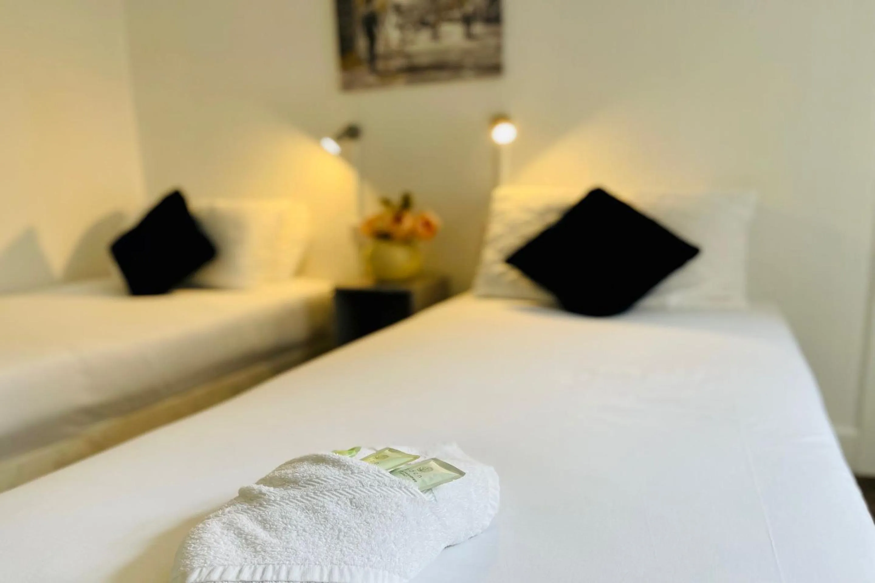 Bedroom in OYO The Sun Hotel