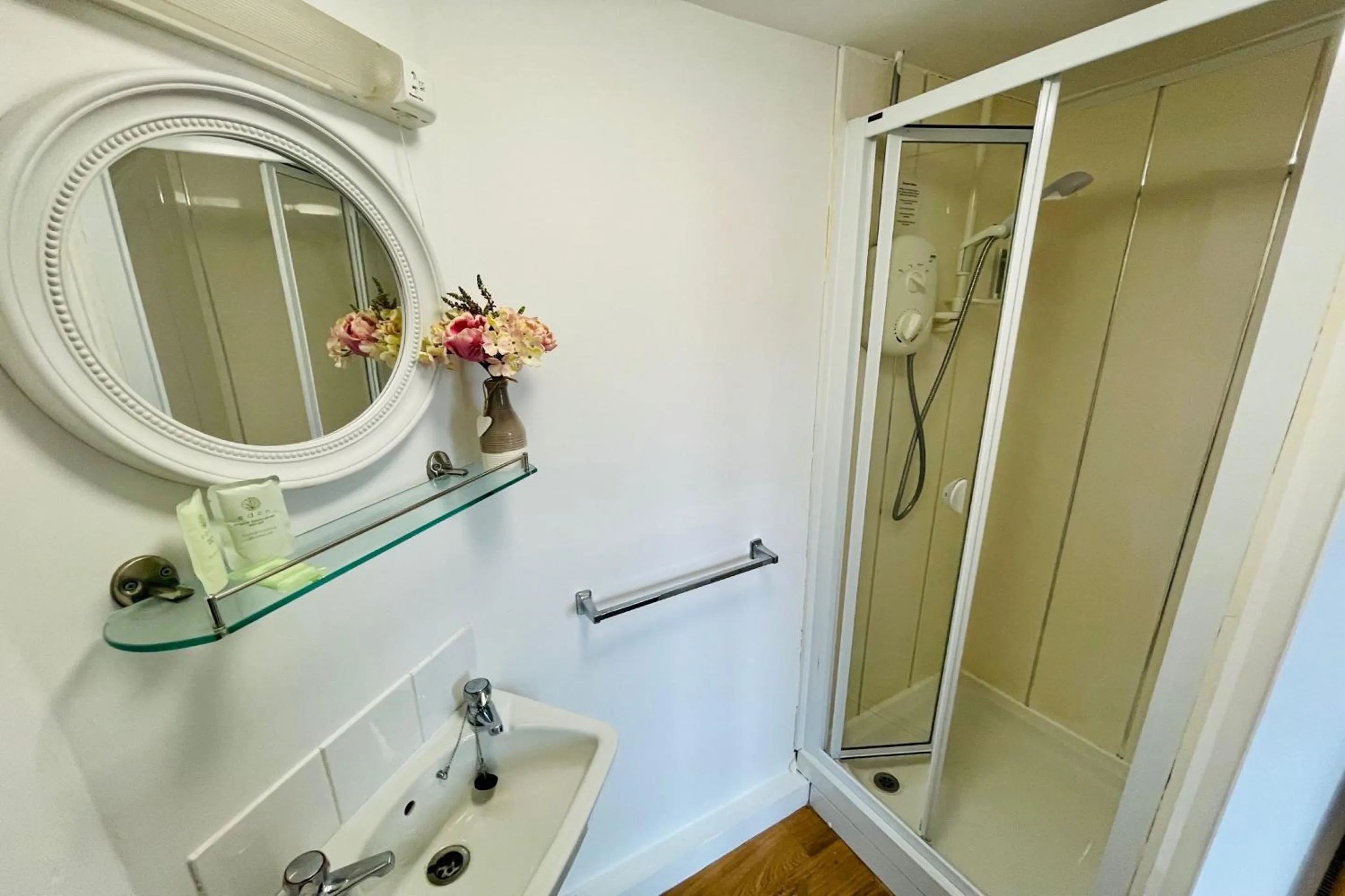 Bathroom in OYO The Sun Hotel