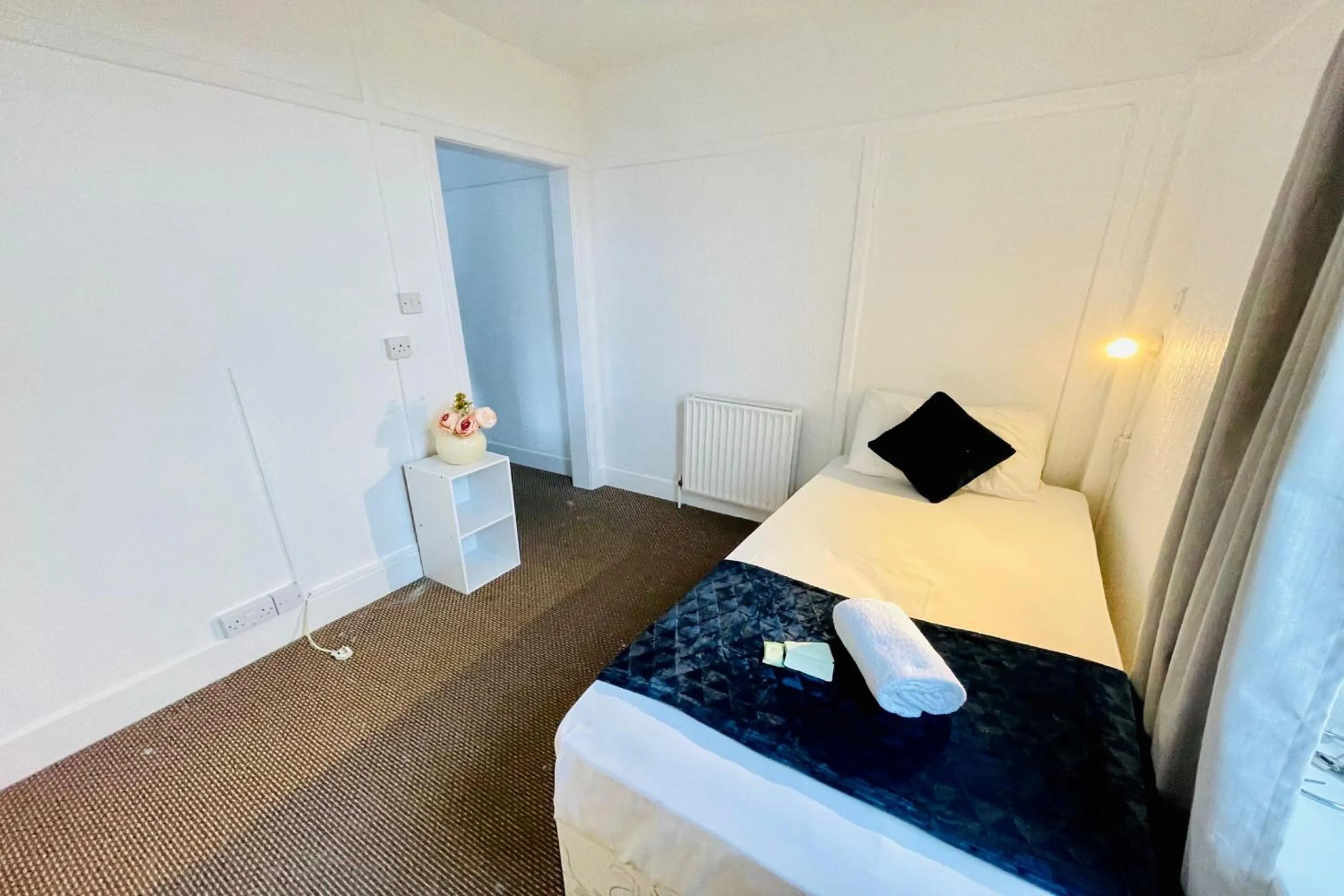 Bedroom in OYO The Sun Hotel