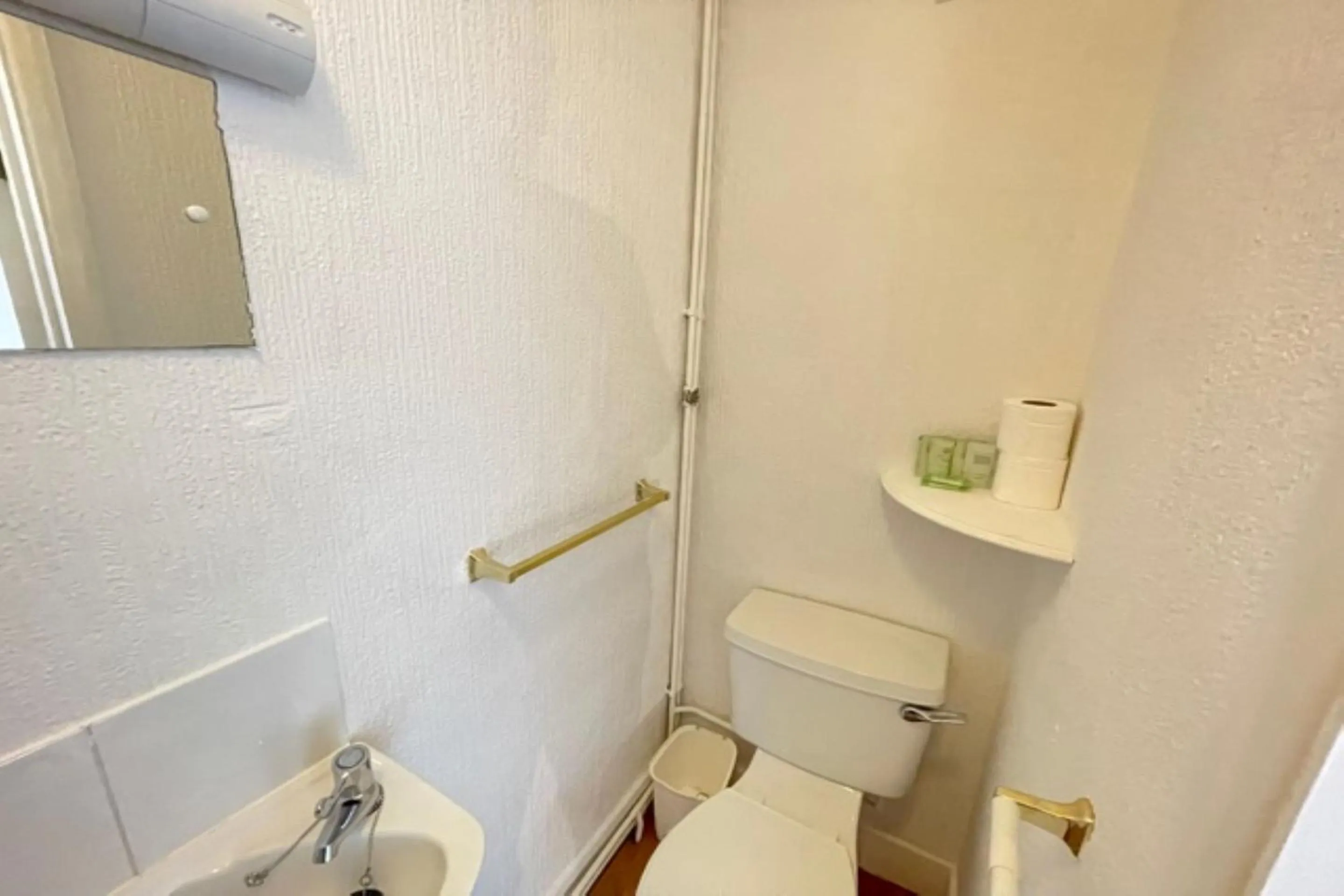 Bathroom in OYO The Sun Hotel