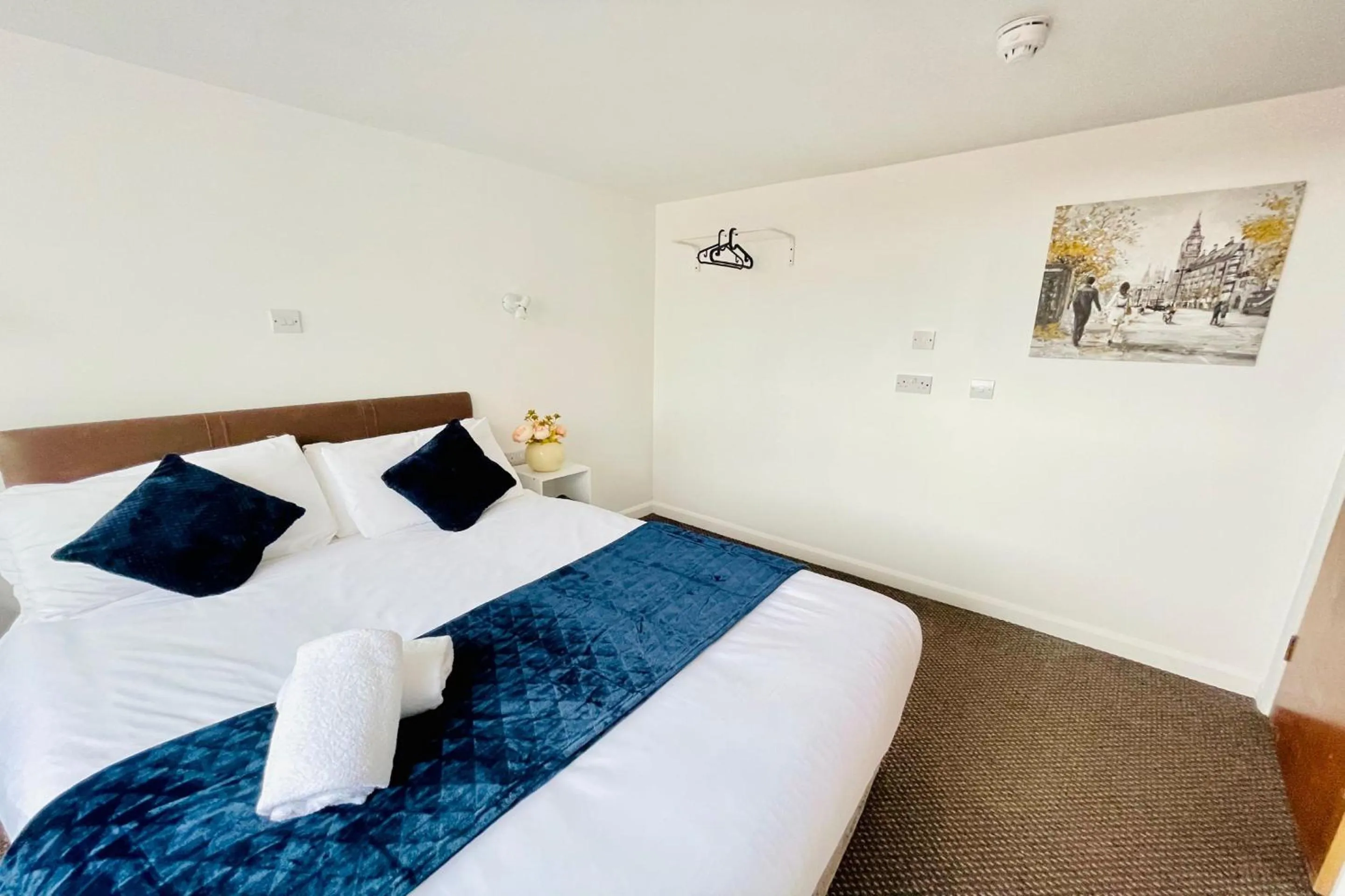 Bedroom in OYO The Sun Hotel