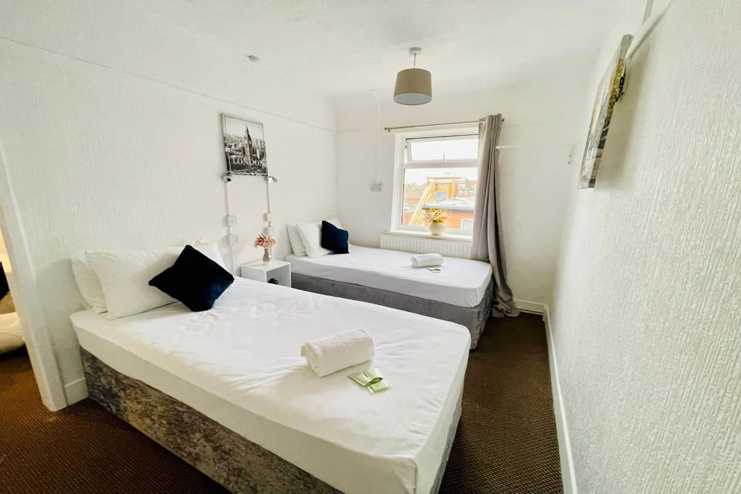 Bedroom in OYO The Sun Hotel