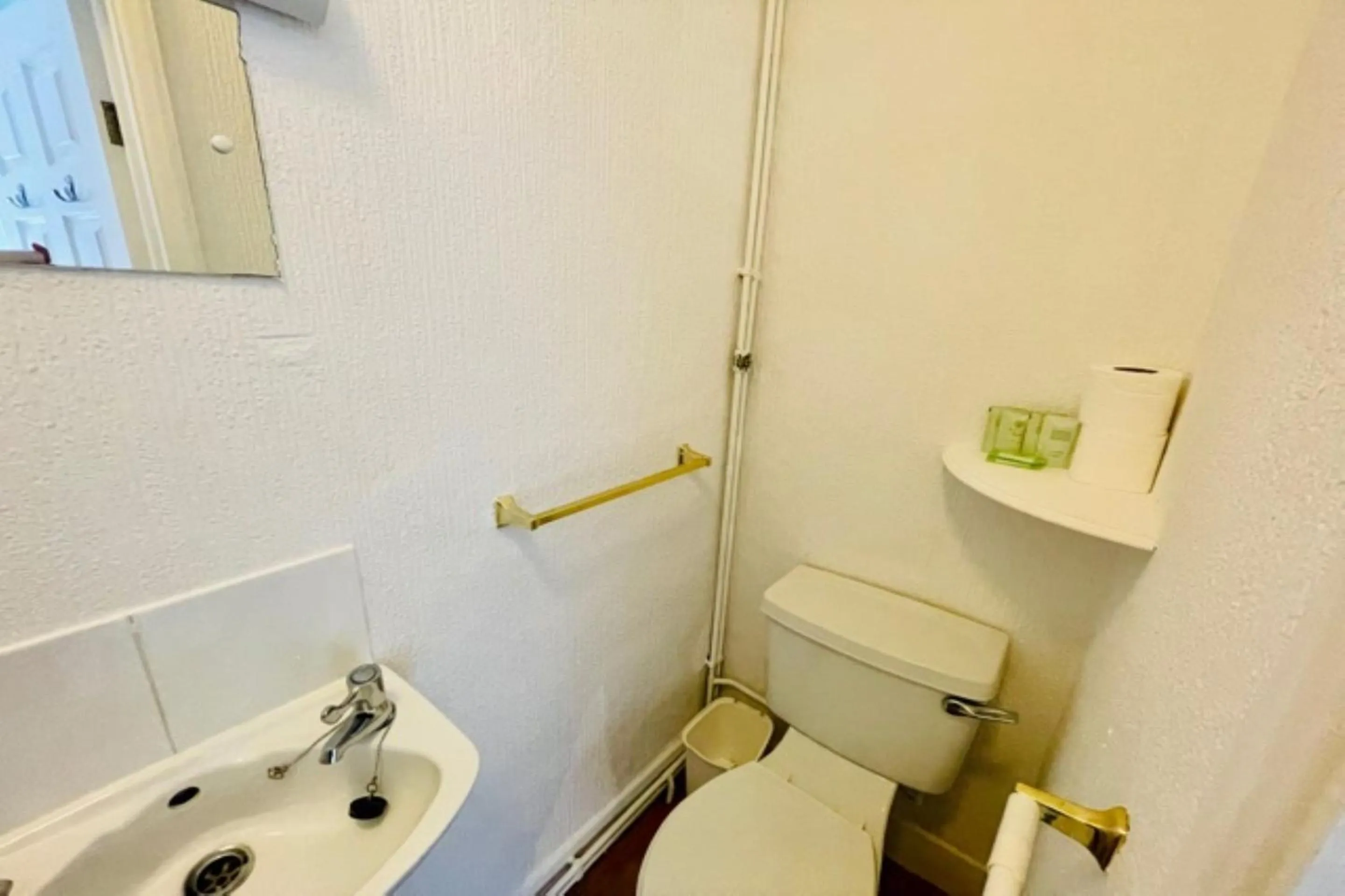 Bathroom in OYO The Sun Hotel