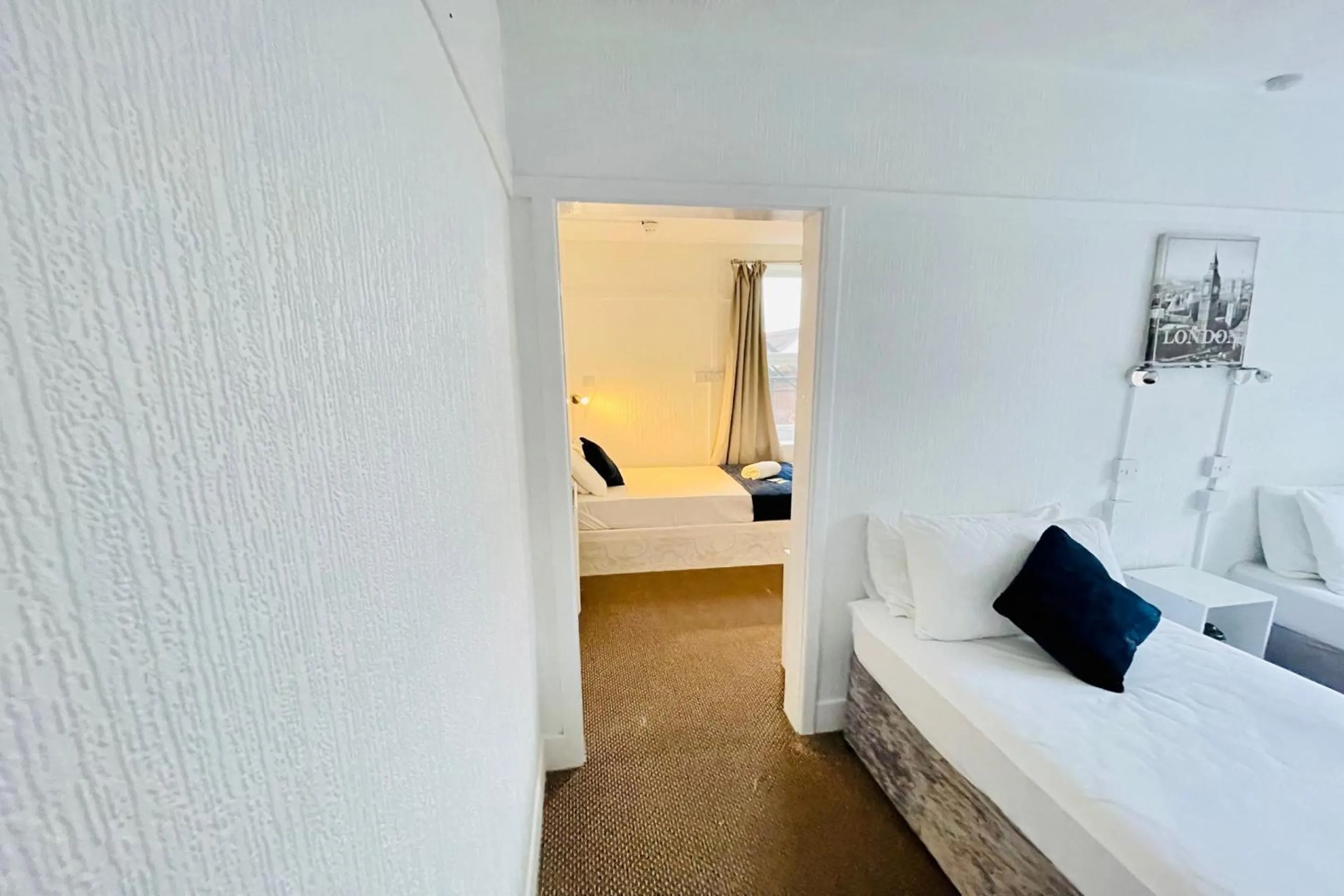 Bedroom in OYO The Sun Hotel