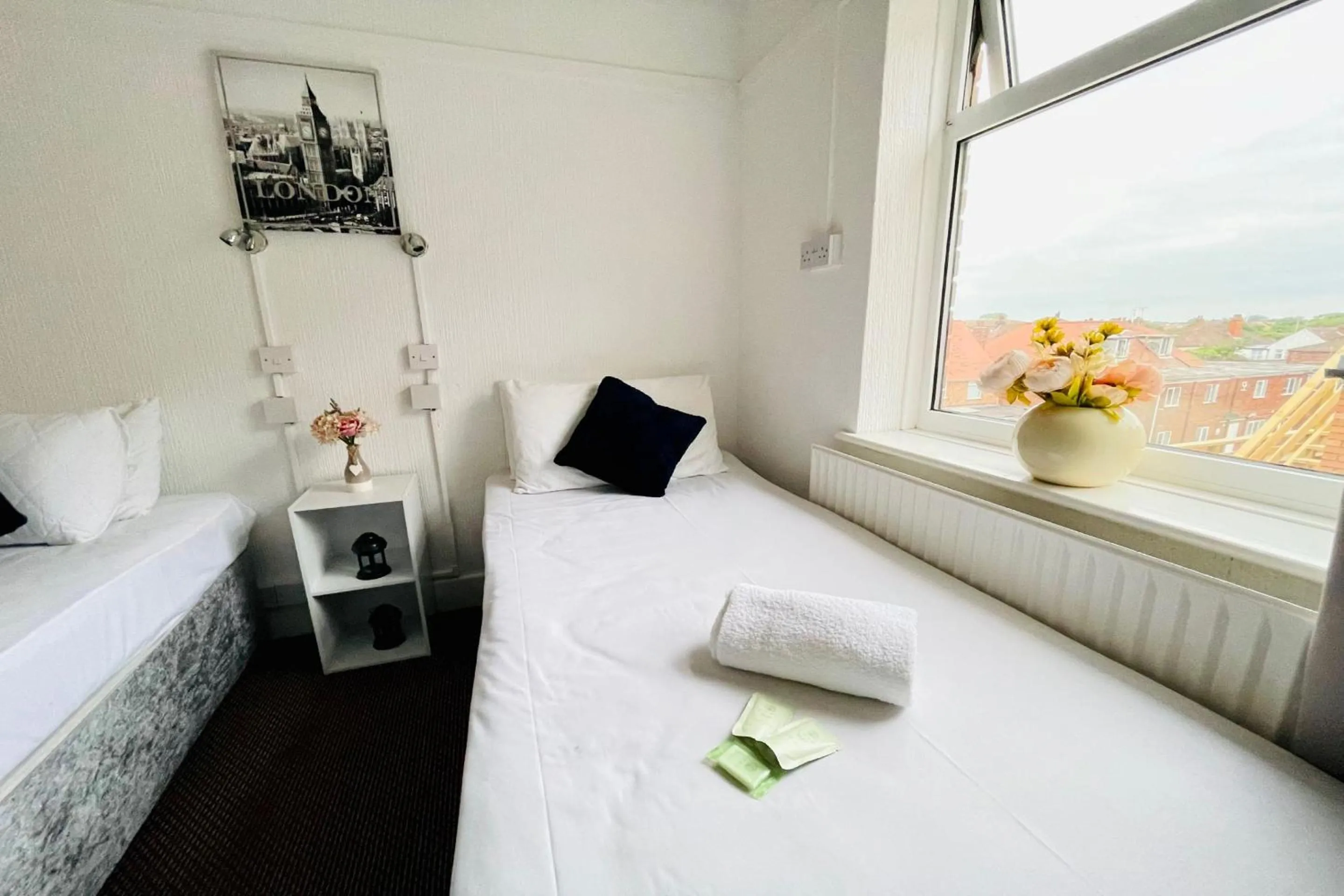 Bedroom in OYO The Sun Hotel