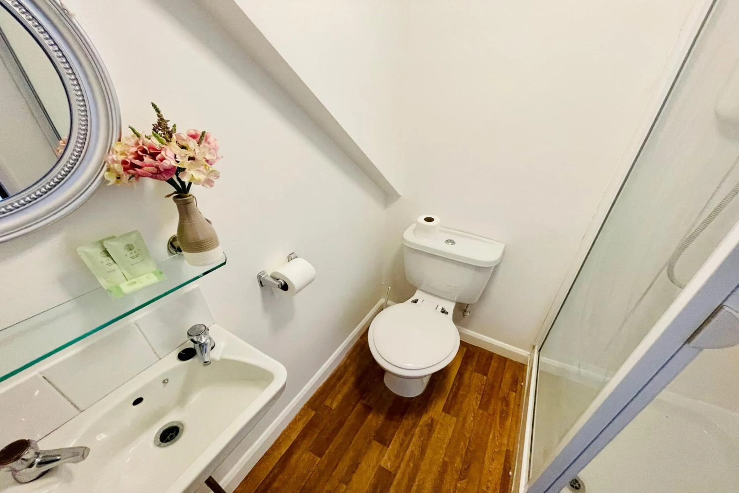 Bathroom in OYO The Sun Hotel