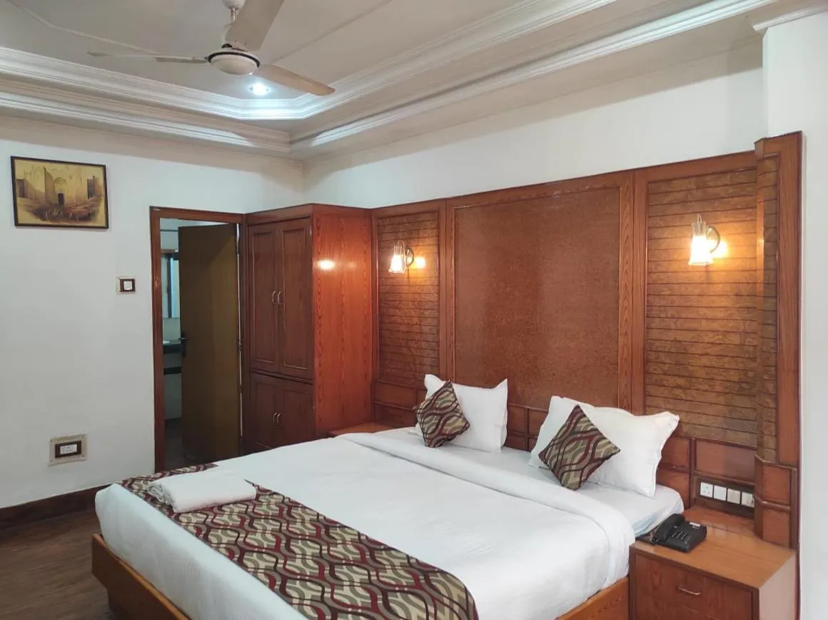 Bed in Hotel Ambarish Grand Residency
