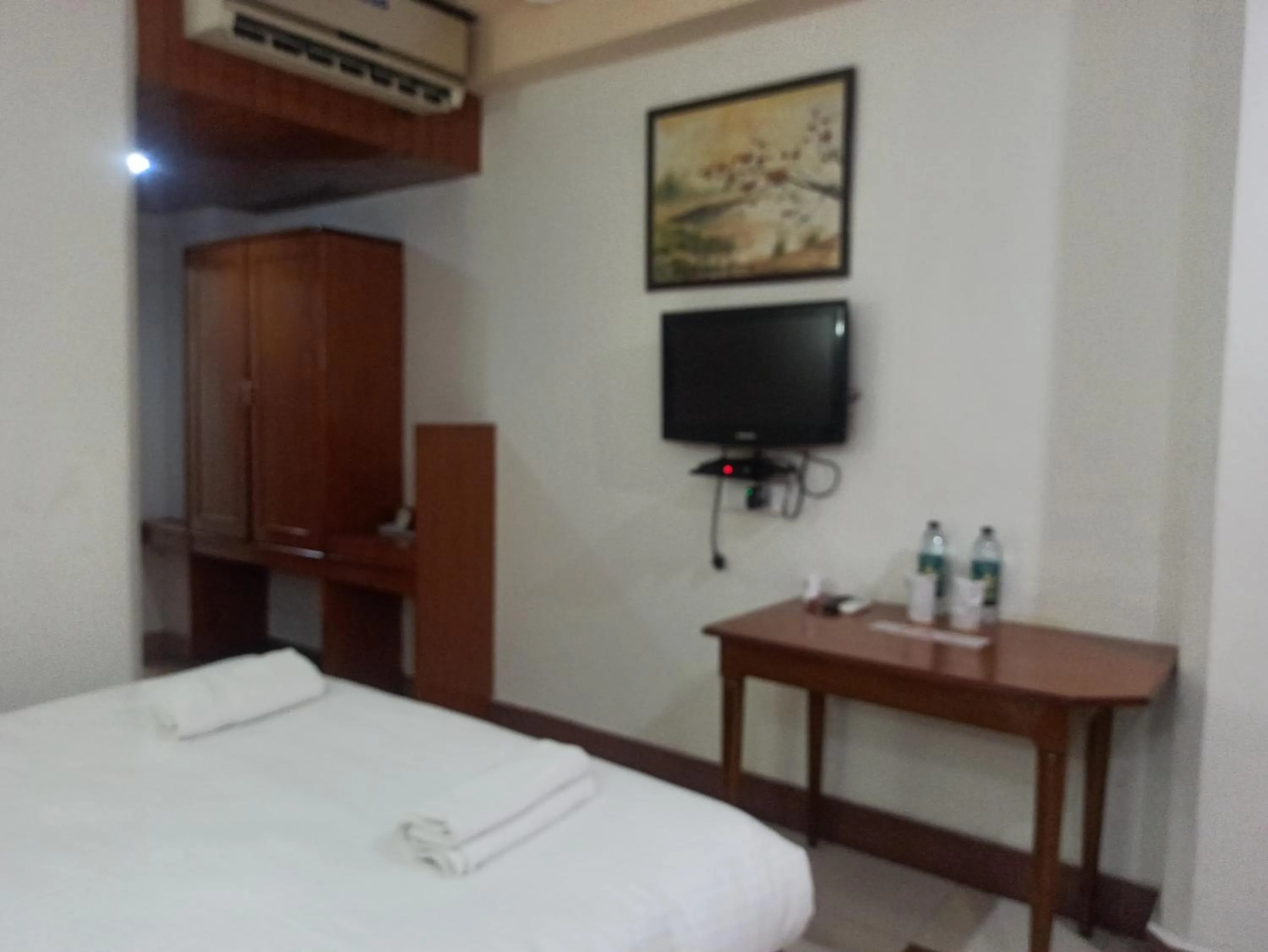 Bed in Hotel Ambarish Grand Residency