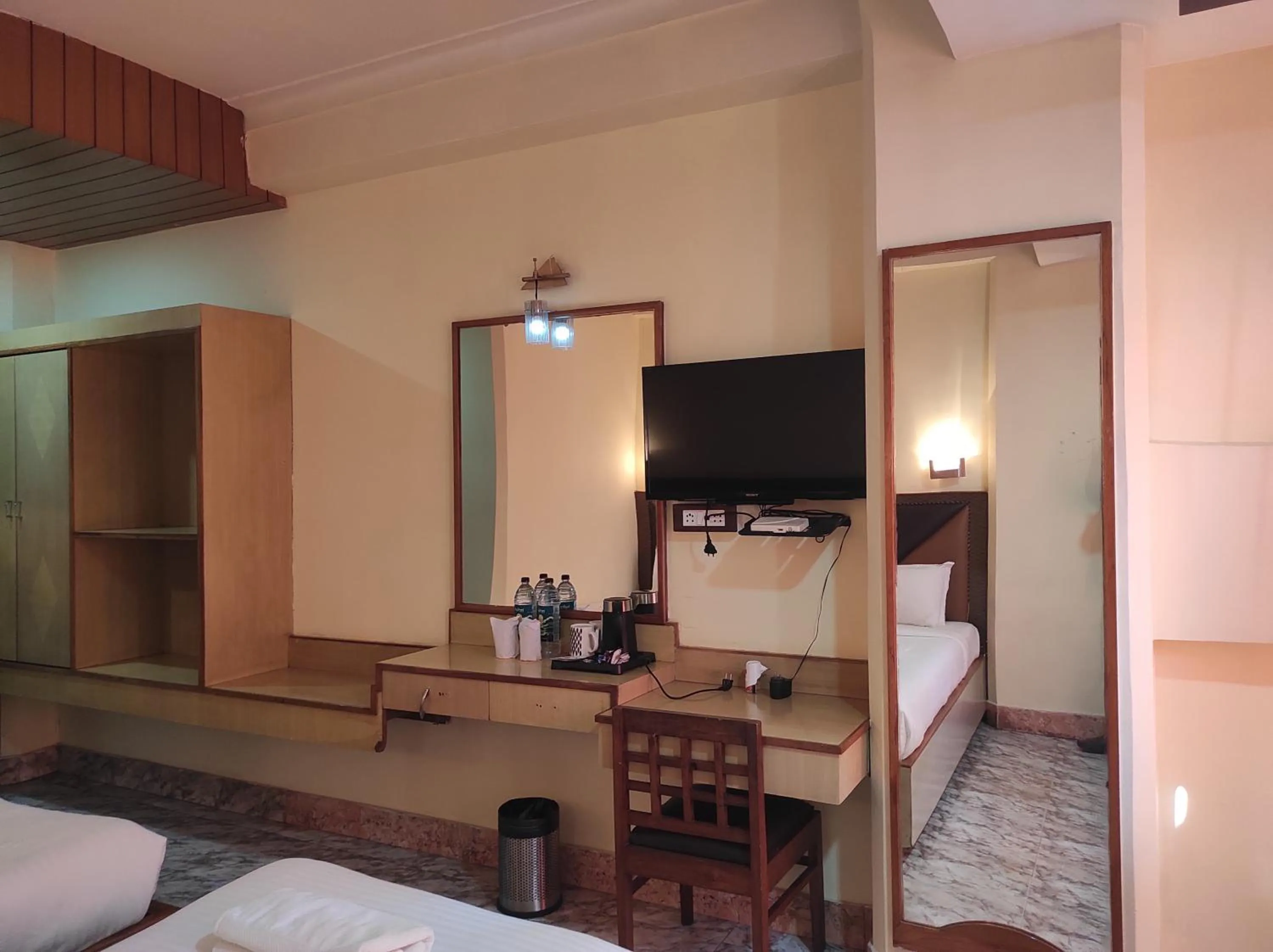 Bed in Hotel Ambarish Grand Residency