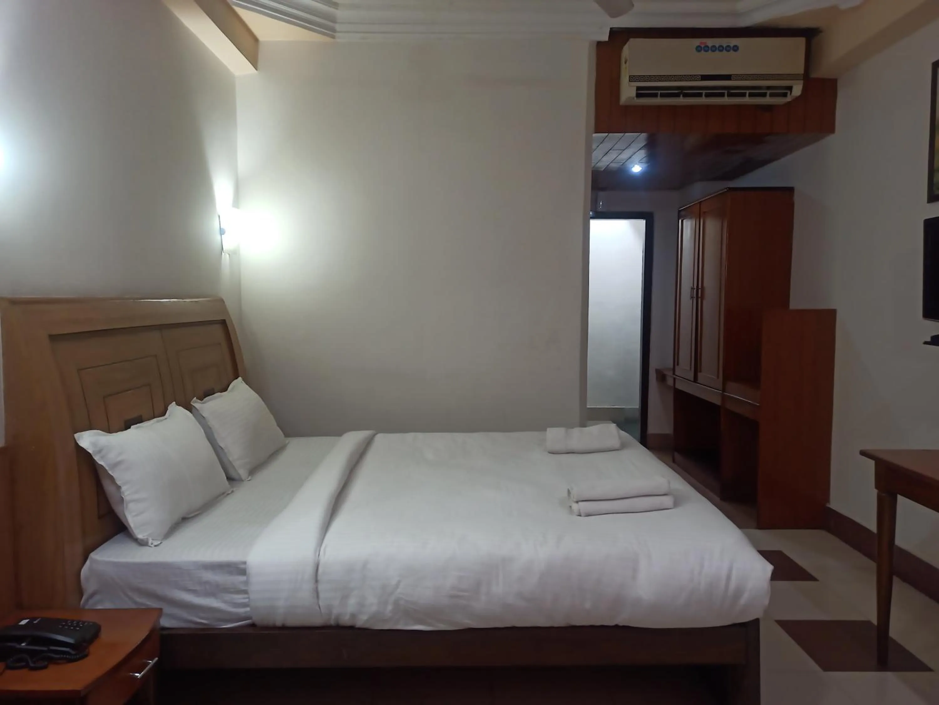 Bed in Hotel Ambarish Grand Residency