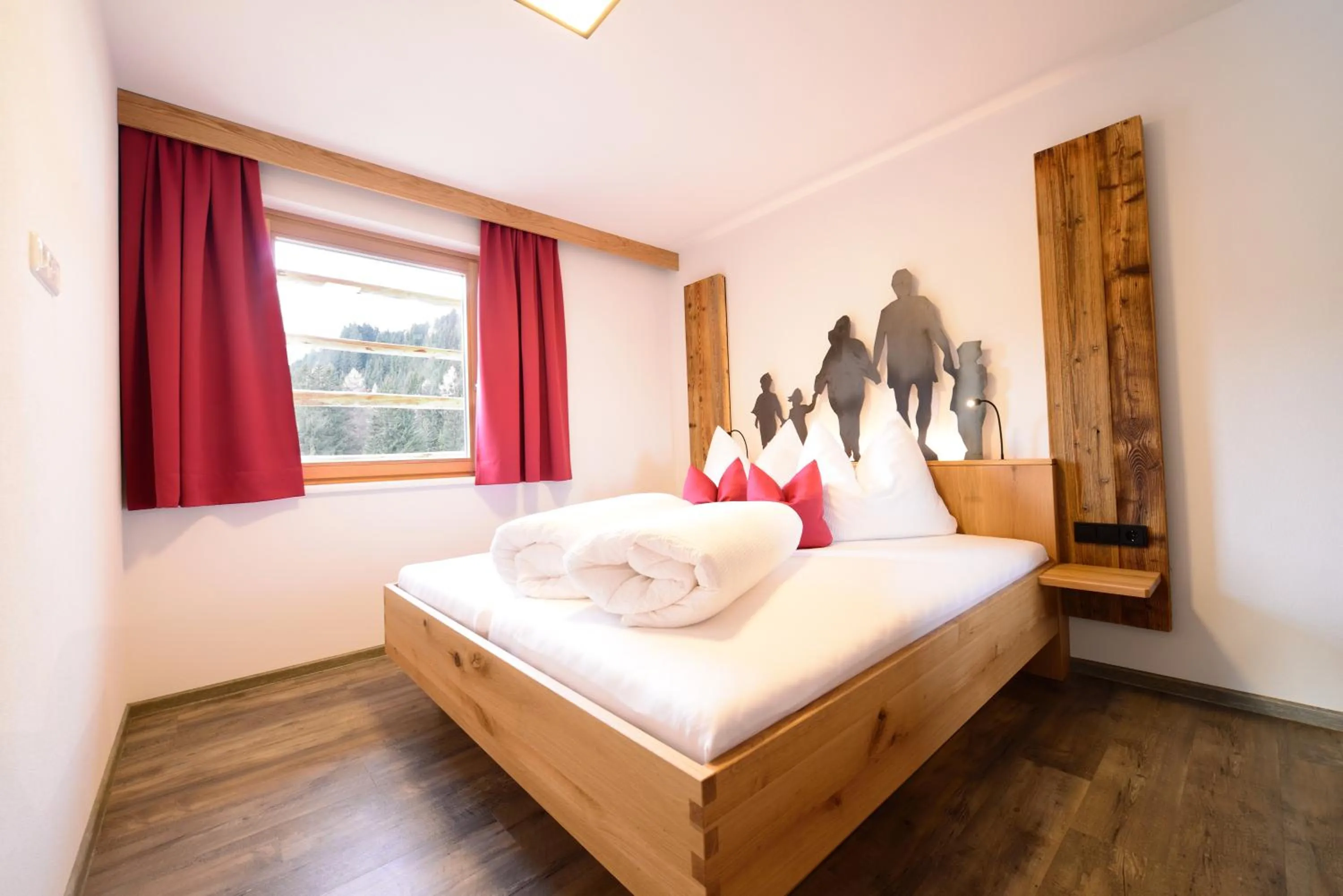 Photo of the whole room, Bed in Almfamilyhotel Scherer