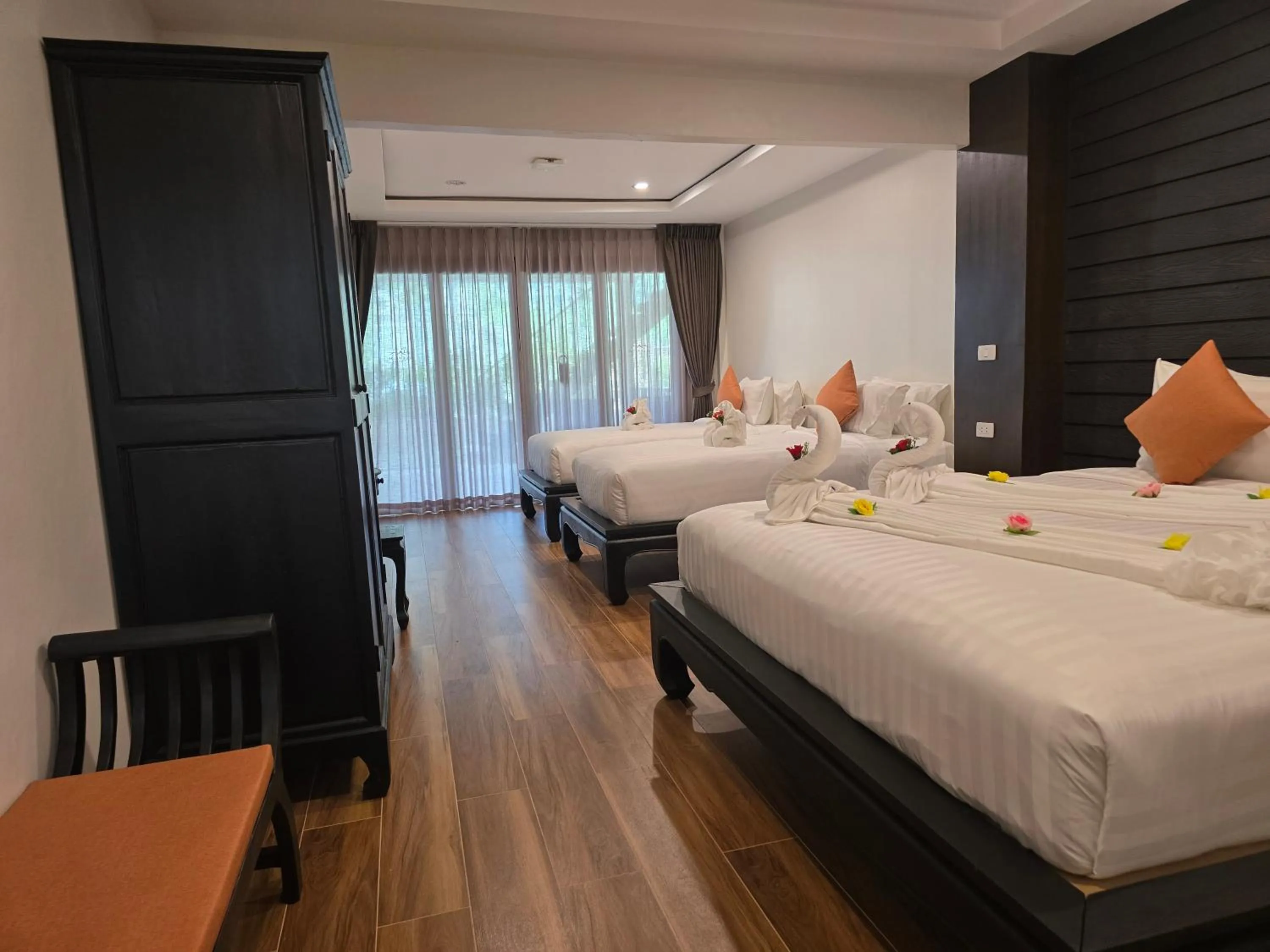 Photo of the whole room, Bed in Blue Palm Residence Kata