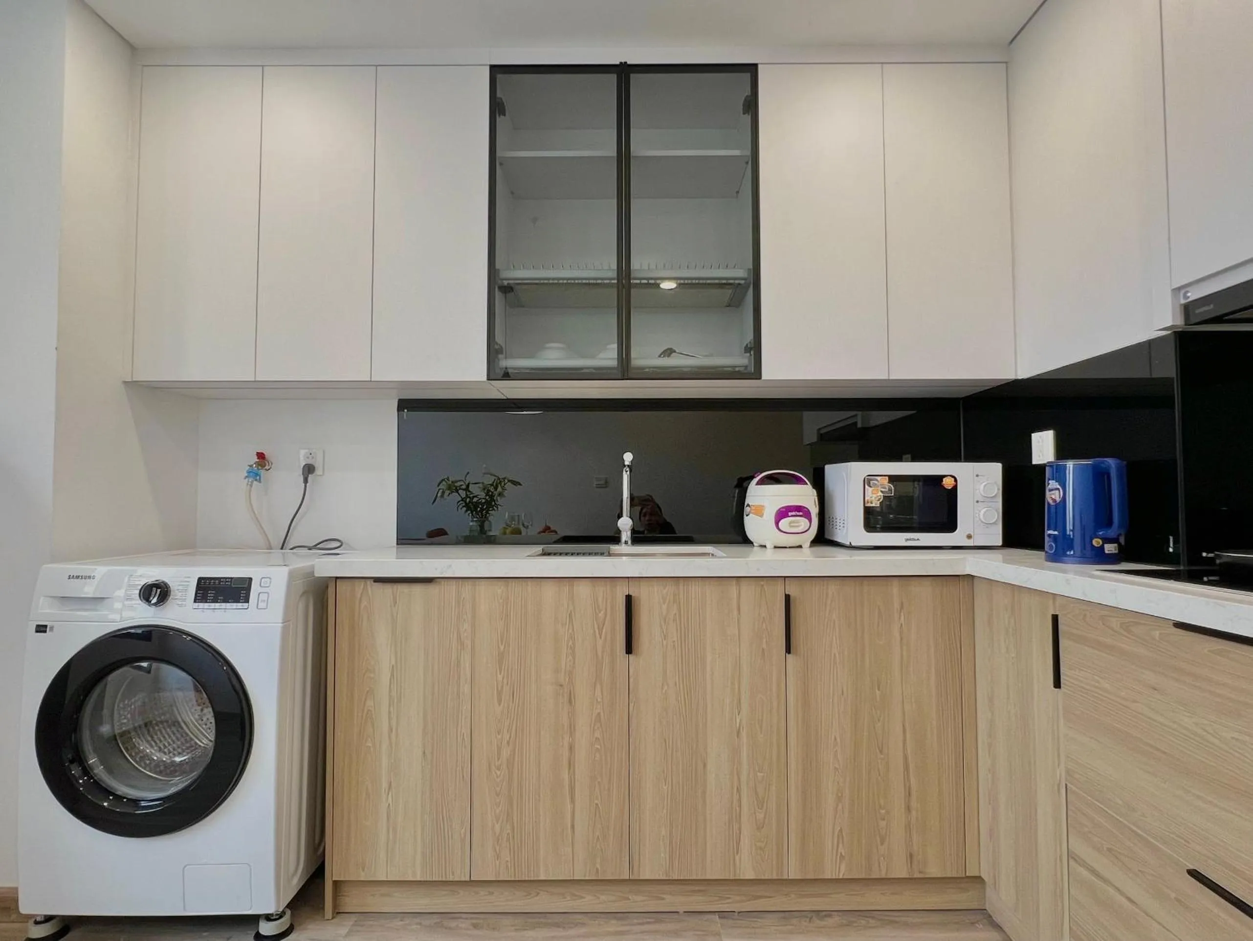 washing machine in 22Land Legend Hotel & Residence