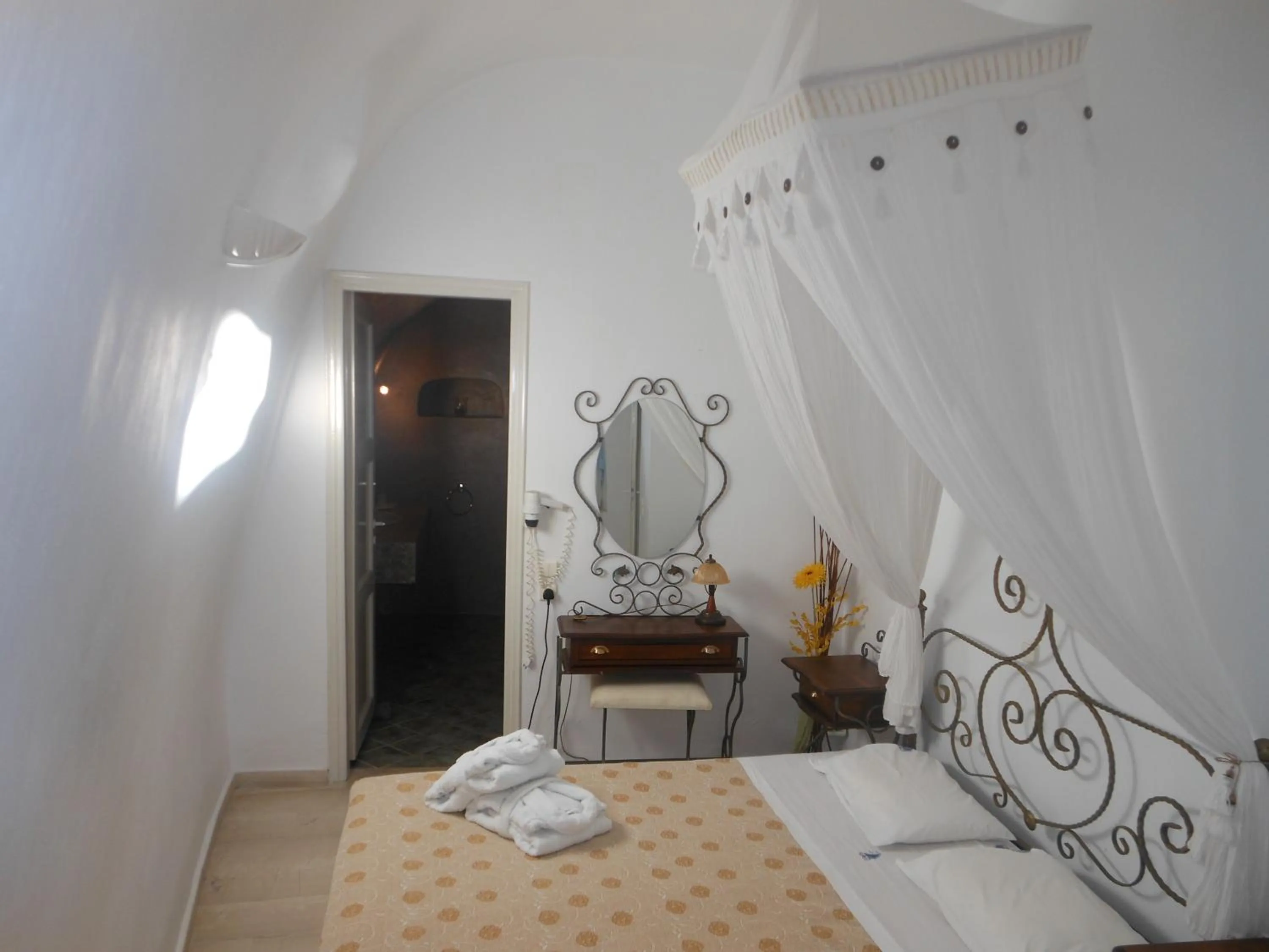 Bed in Nomikos Villas