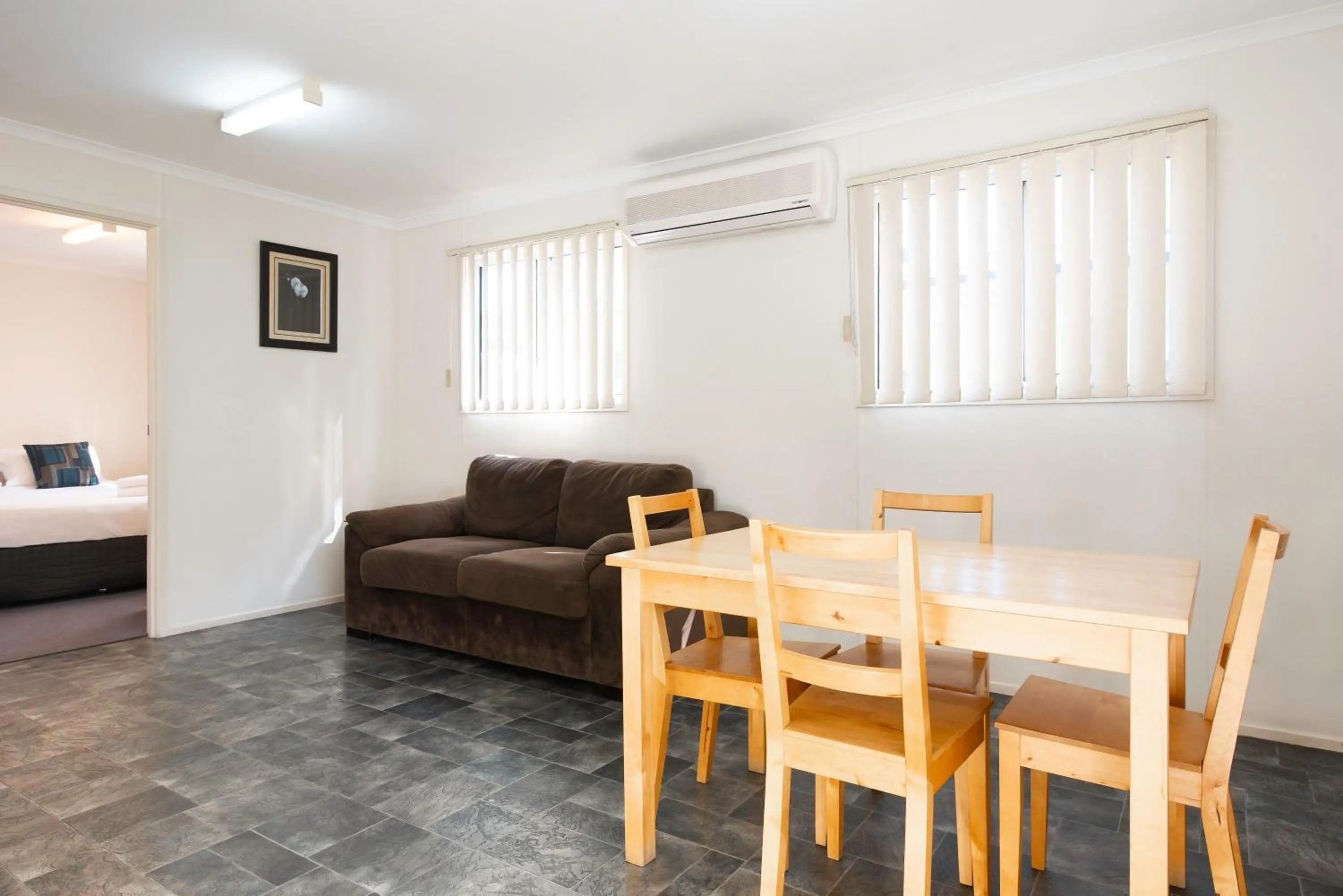 Dining area, Bed in Echo Holiday Parks - Windsor Gardens