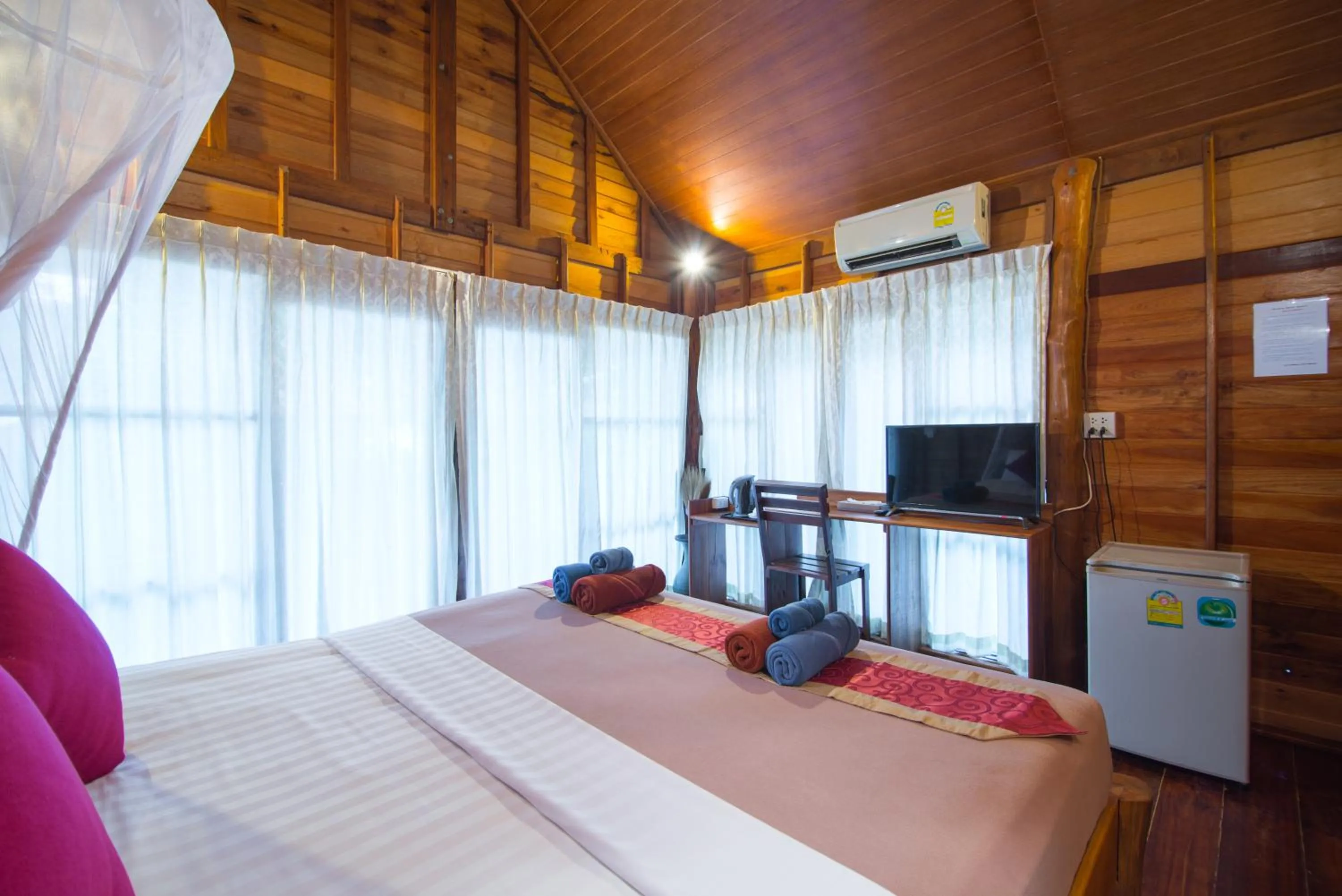 Bed in Thiwson Beach Resort - SHA Extra Plus