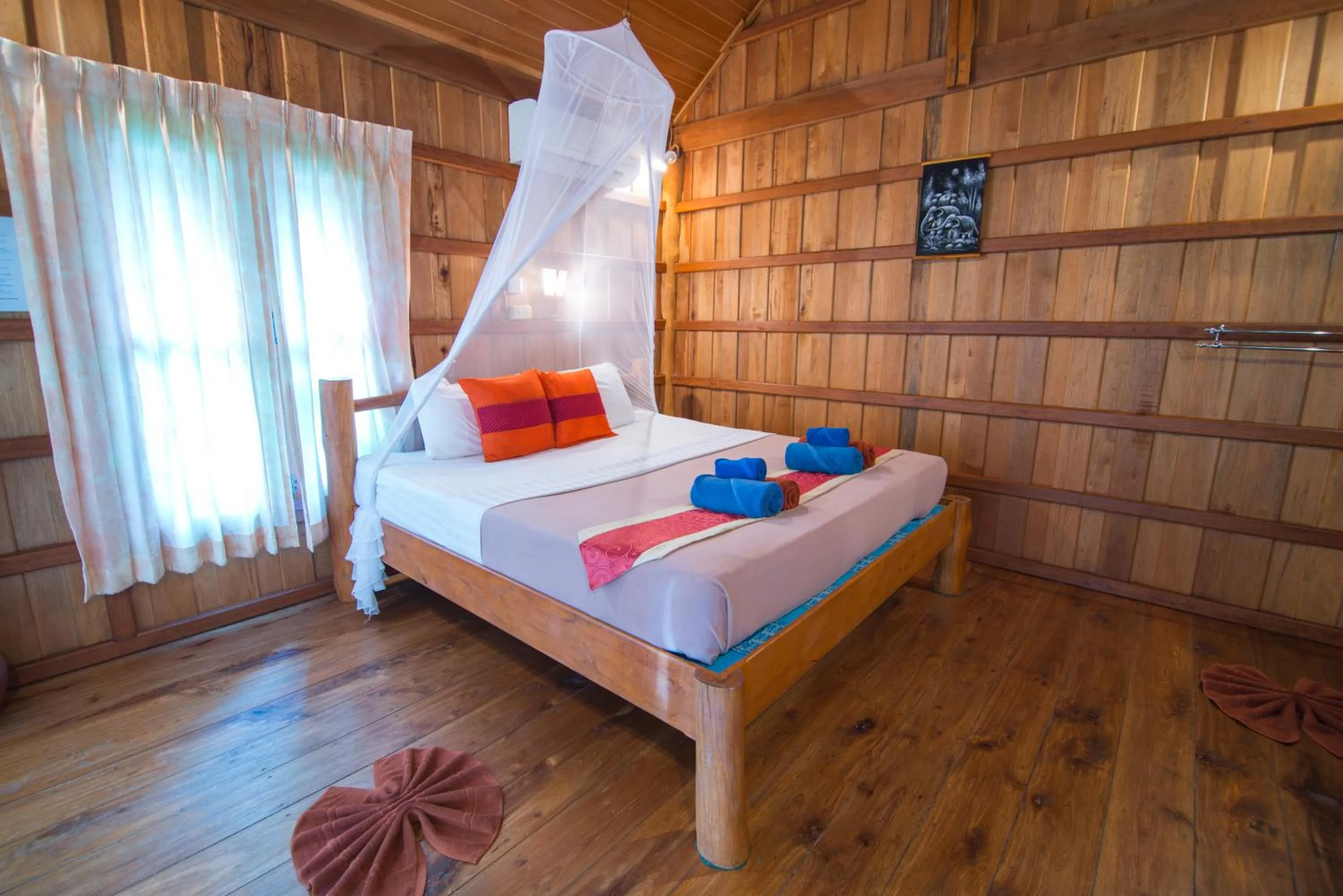 Bed in Thiwson Beach Resort - SHA Extra Plus