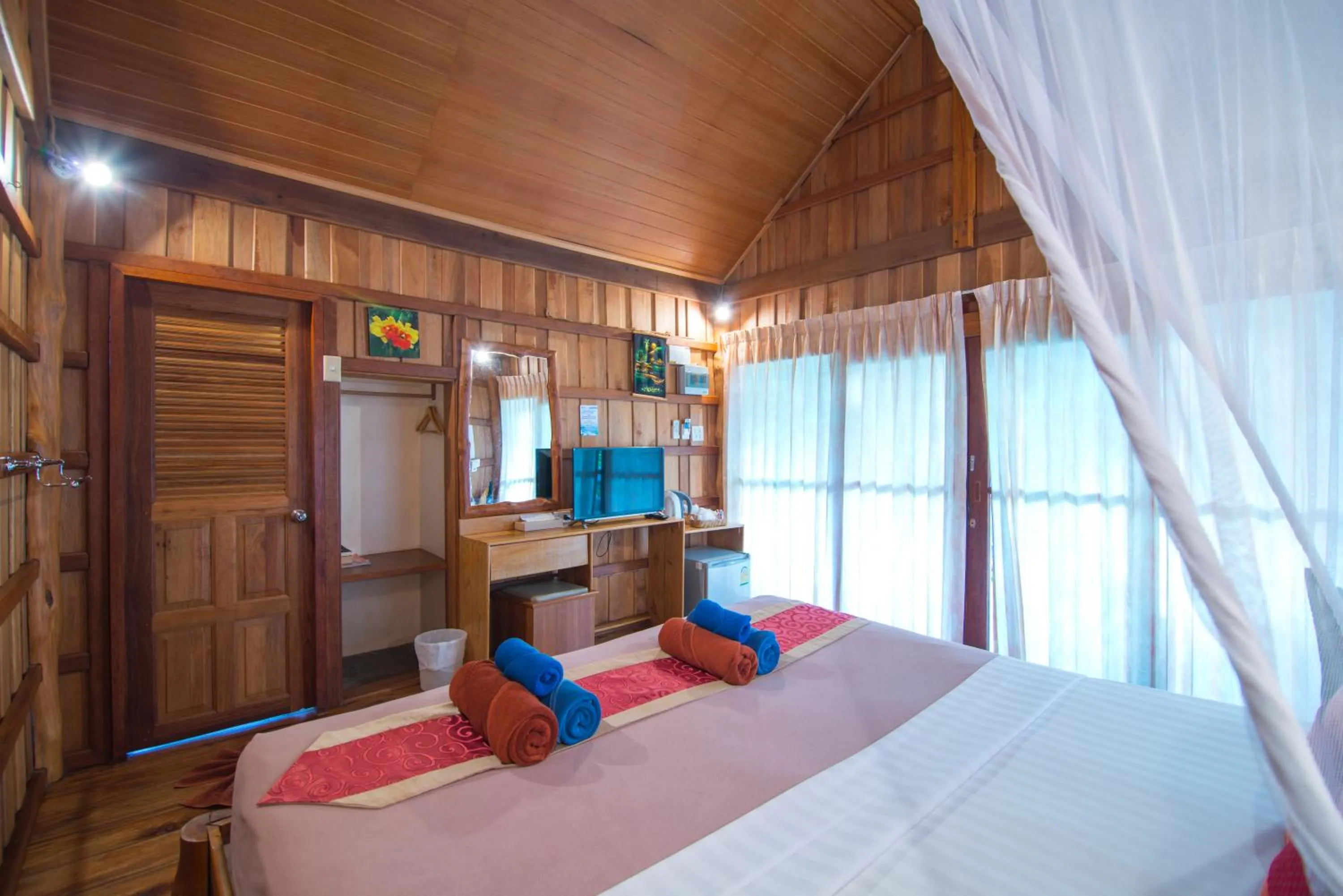 Bed in Thiwson Beach Resort - SHA Extra Plus