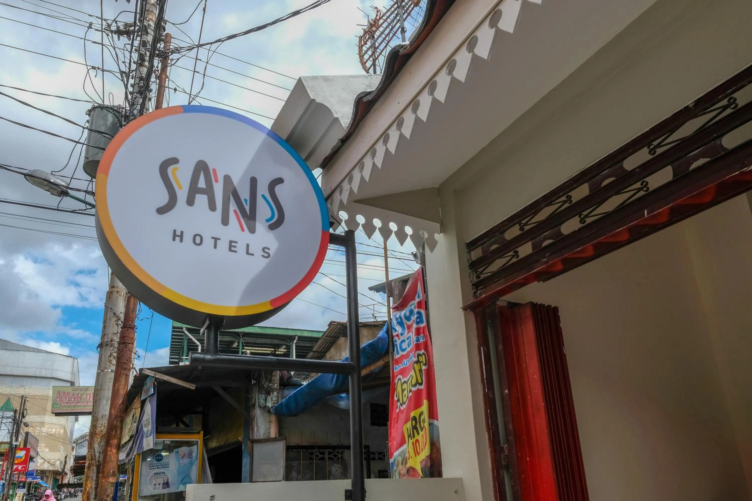 Property logo or sign in Sans Hotel Beskalan Malioboro