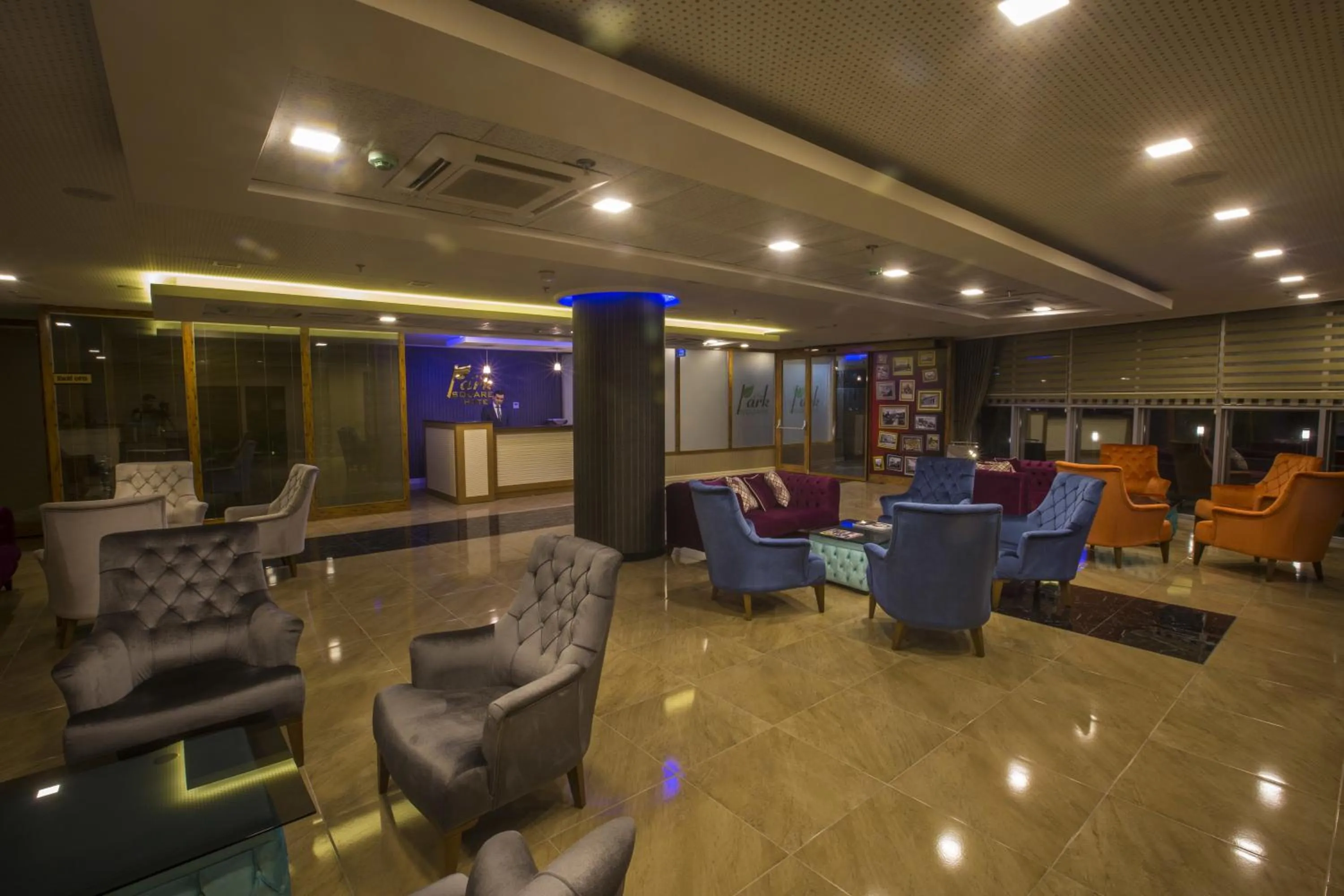 Communal lounge/ TV room in Park Square Hotel