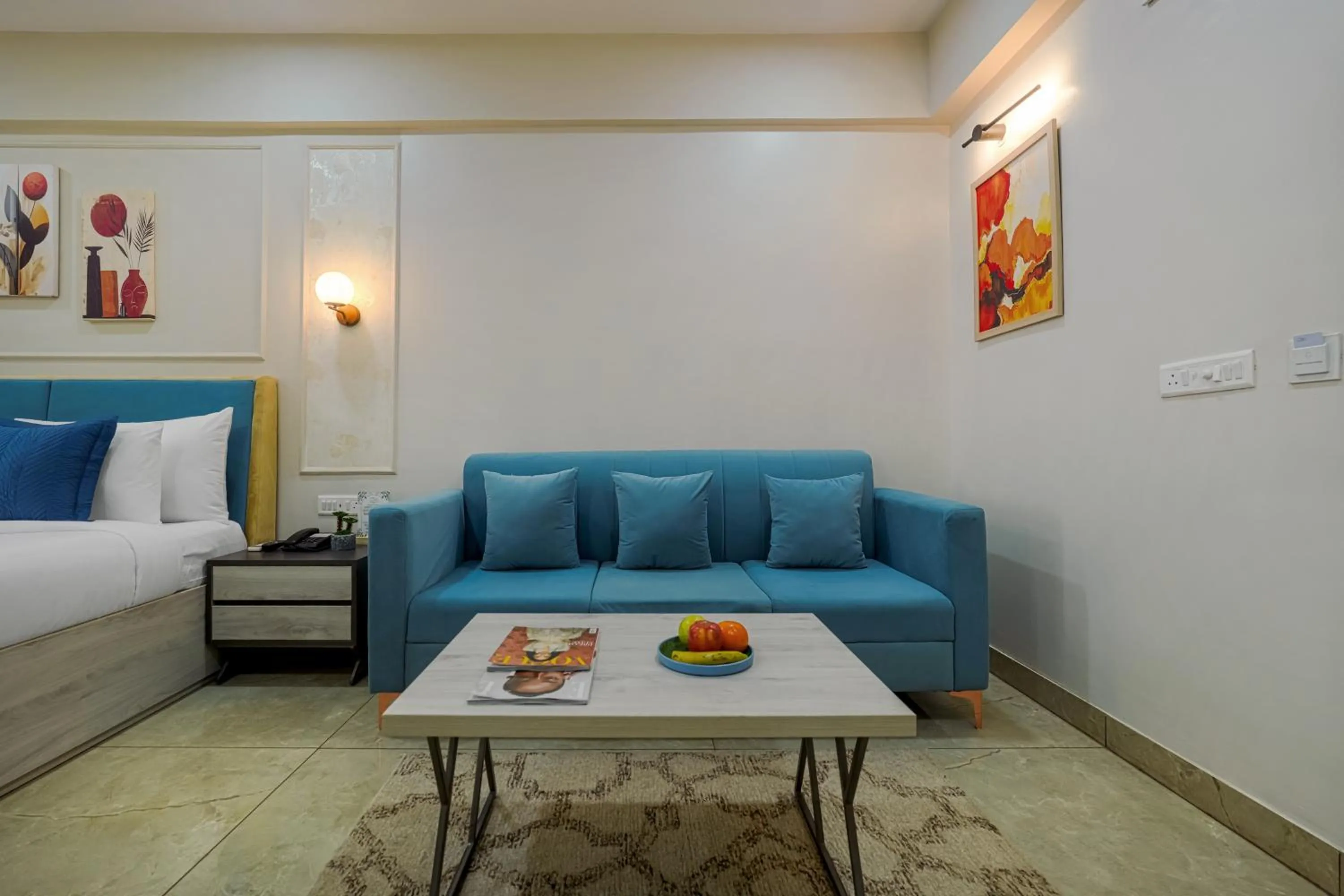 Seating area, Bed in Urban Suites by BluSalzz, Jaipur - Rajasthan