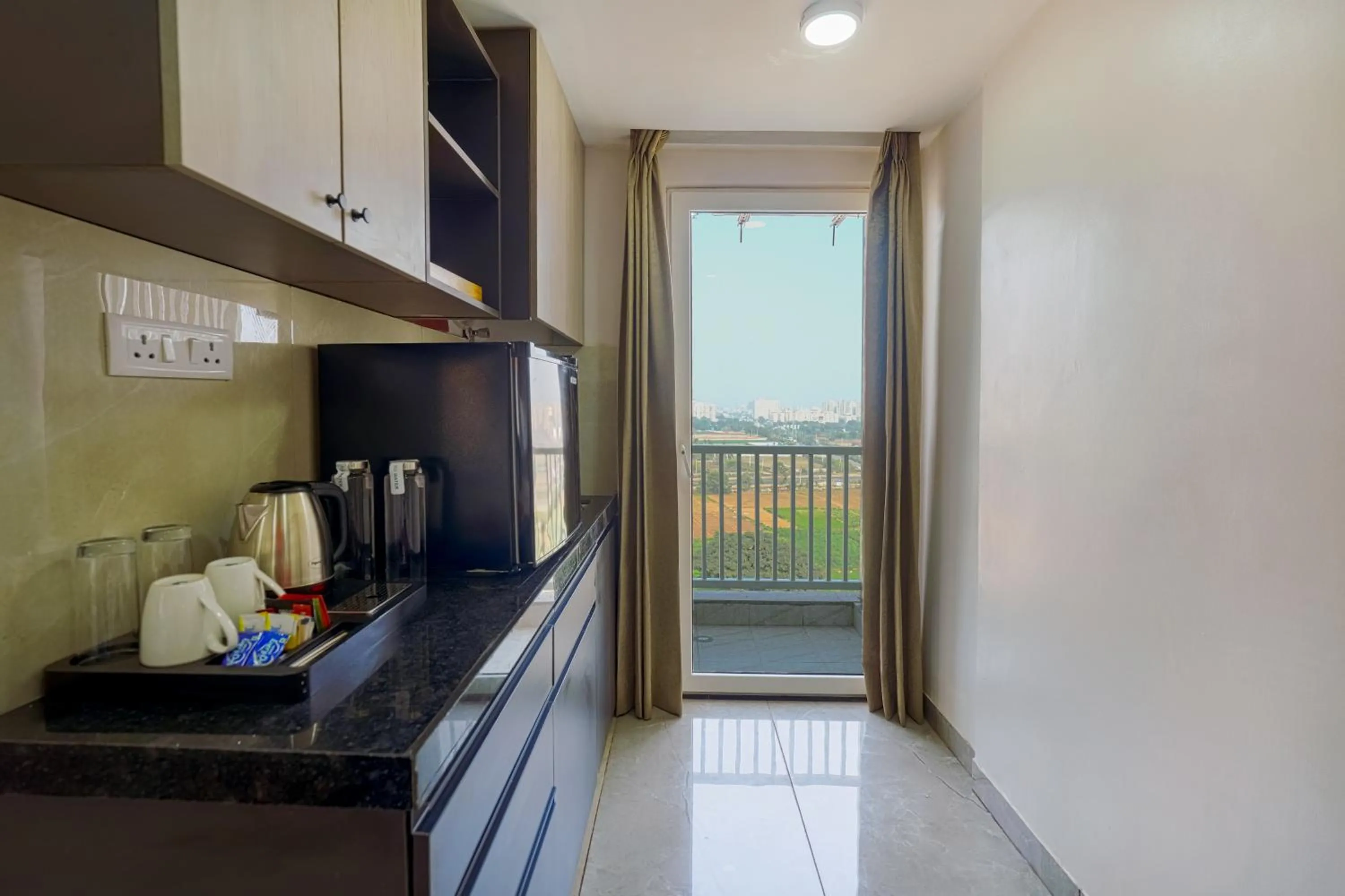 kitchen in Urban Suites by BluSalzz, Jaipur - Rajasthan
