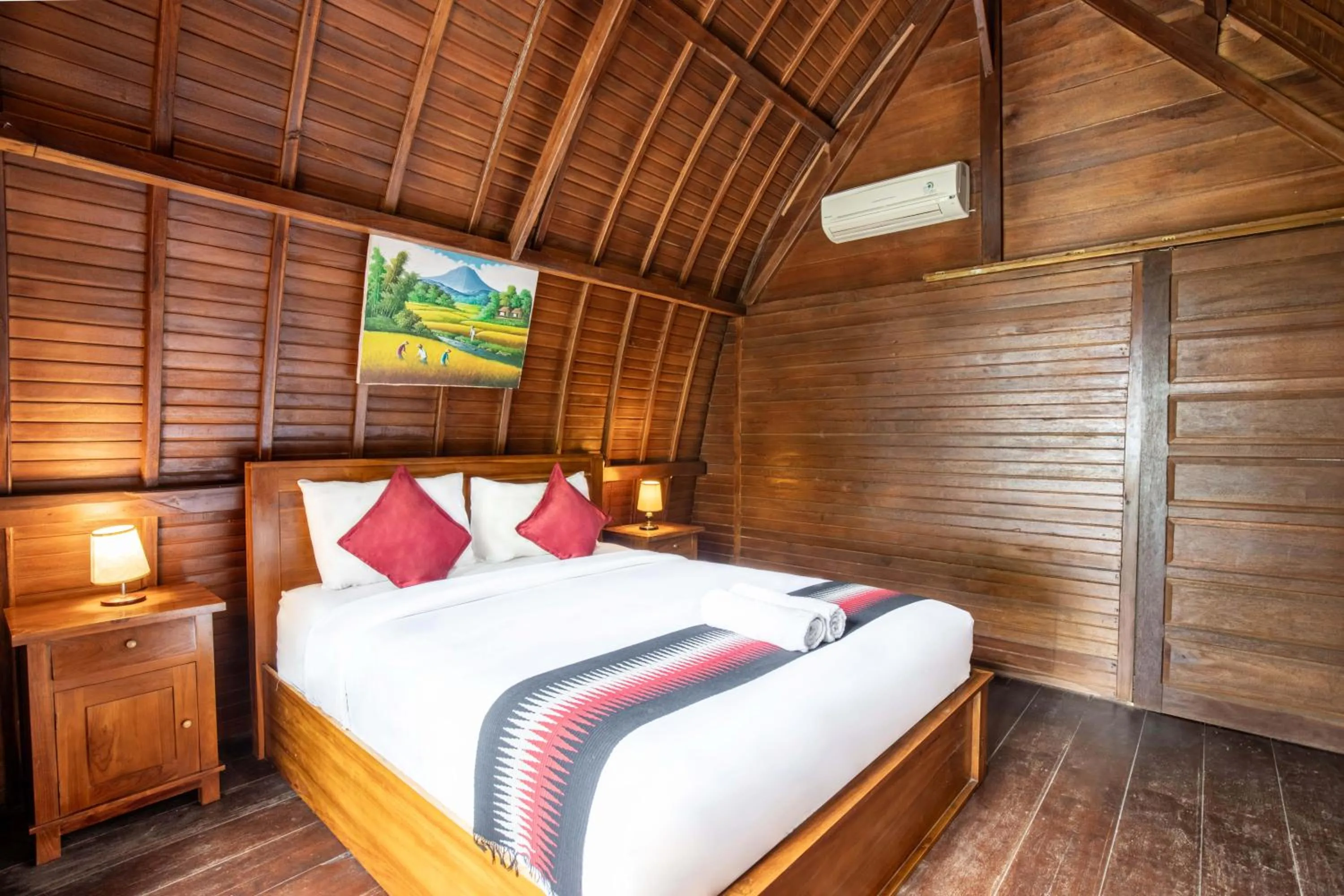 Bed in Coconut Hill Cottage