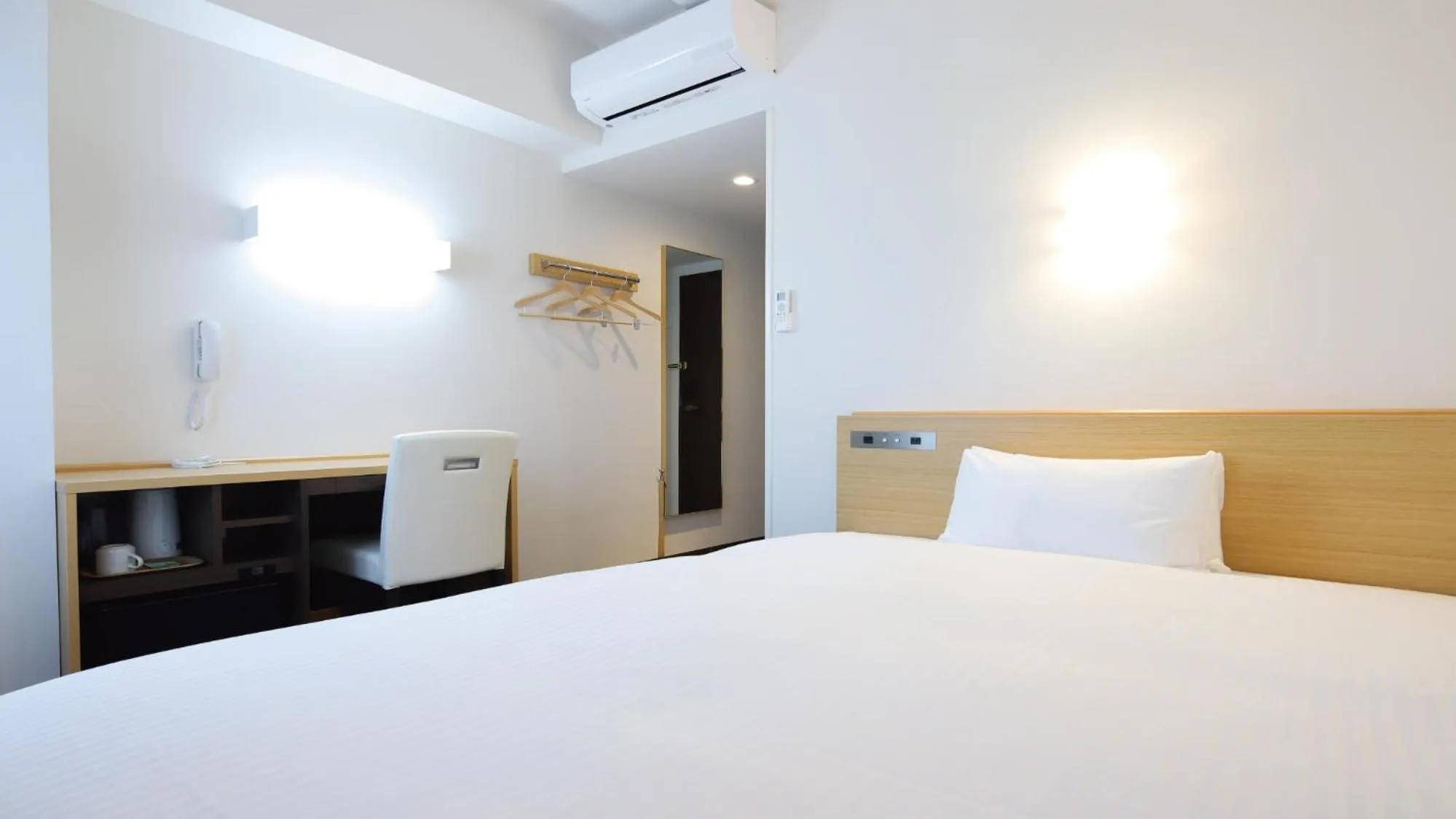 Bed in AB Hotel Kani