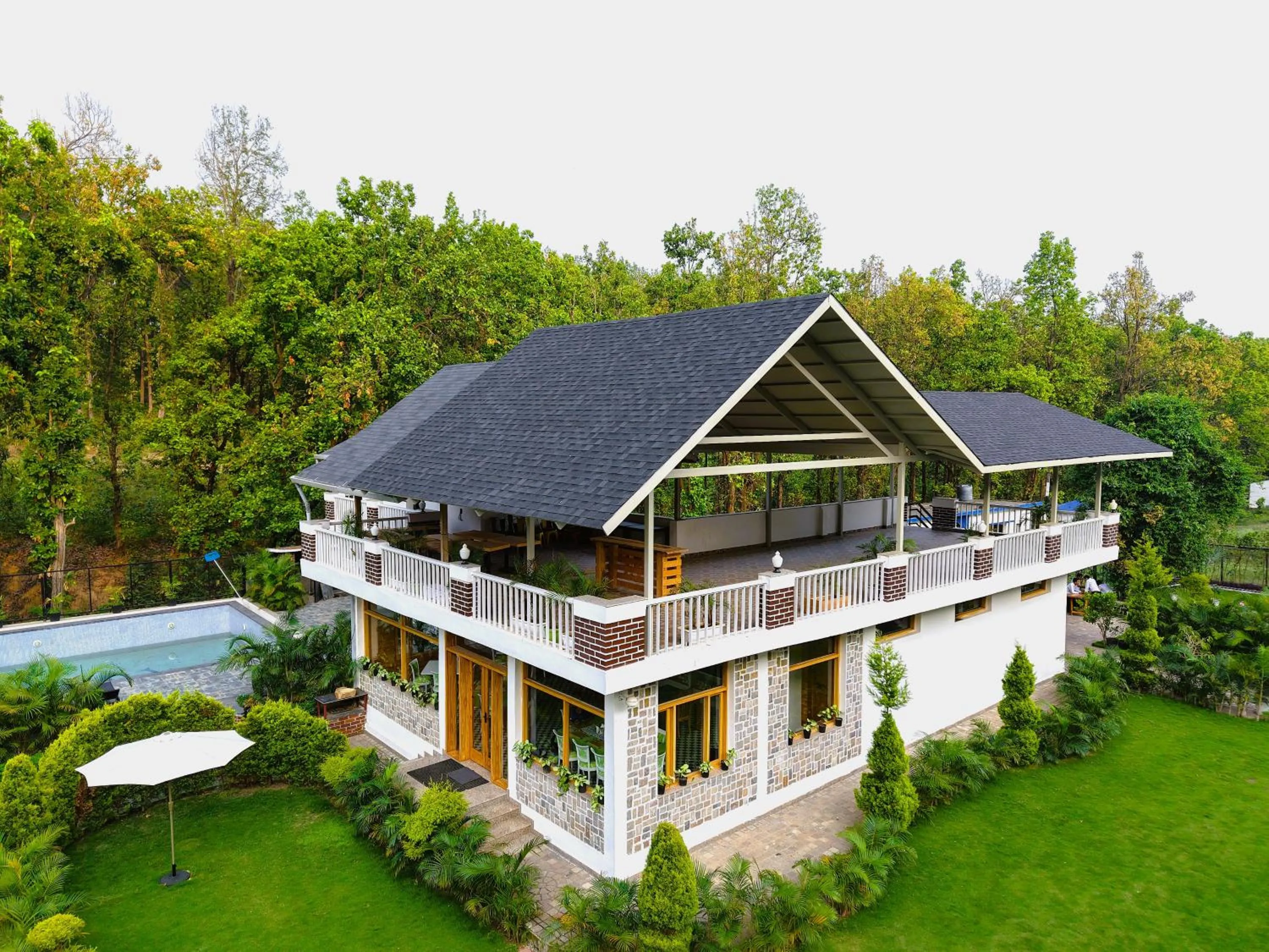 Property logo or sign in Megha Resort & Villas, Dehradun-Where Nature Pampers You