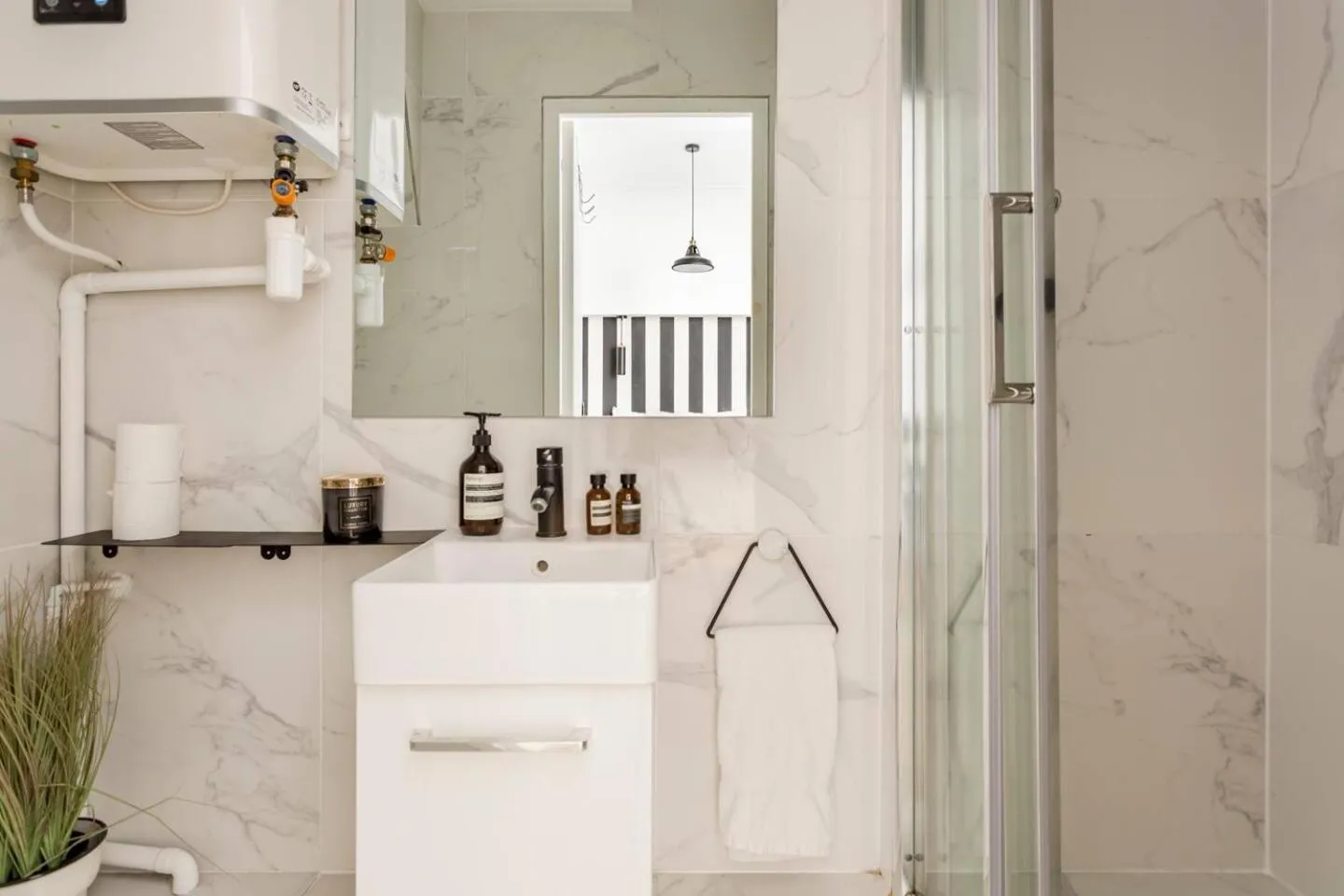 Bathroom in Reva Suites